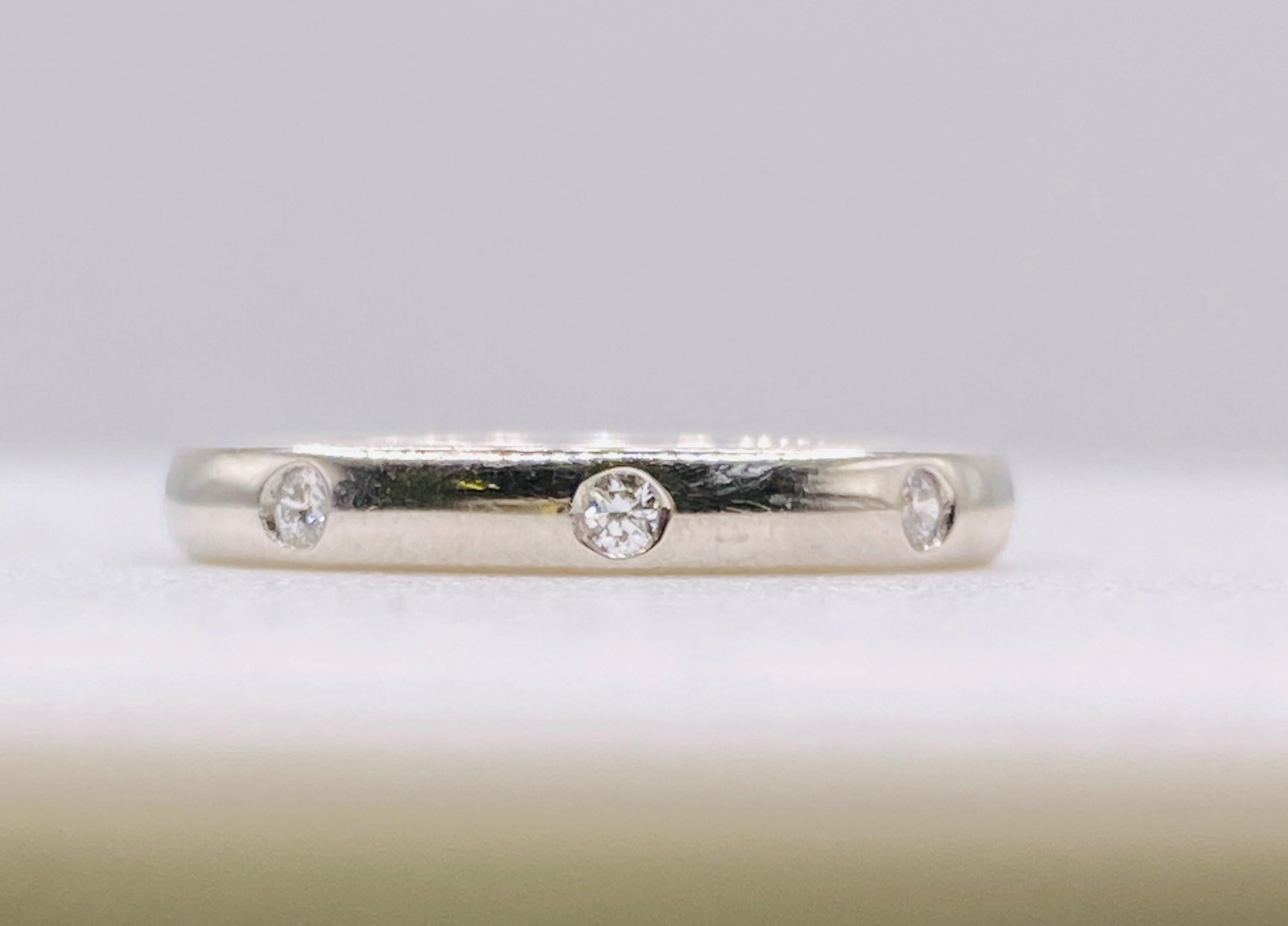 Van Cleef & Arpels Tendrement Etoiles Diamond Platinum Band Ring In Good Condition For Sale In DALLAS, TX