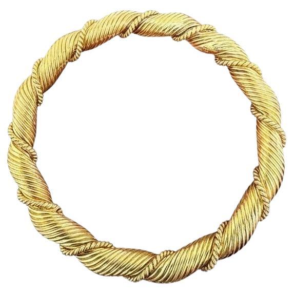 Van Cleef 
Arpels Textured Gold Twist Bangle, circa 1970s For Sale
