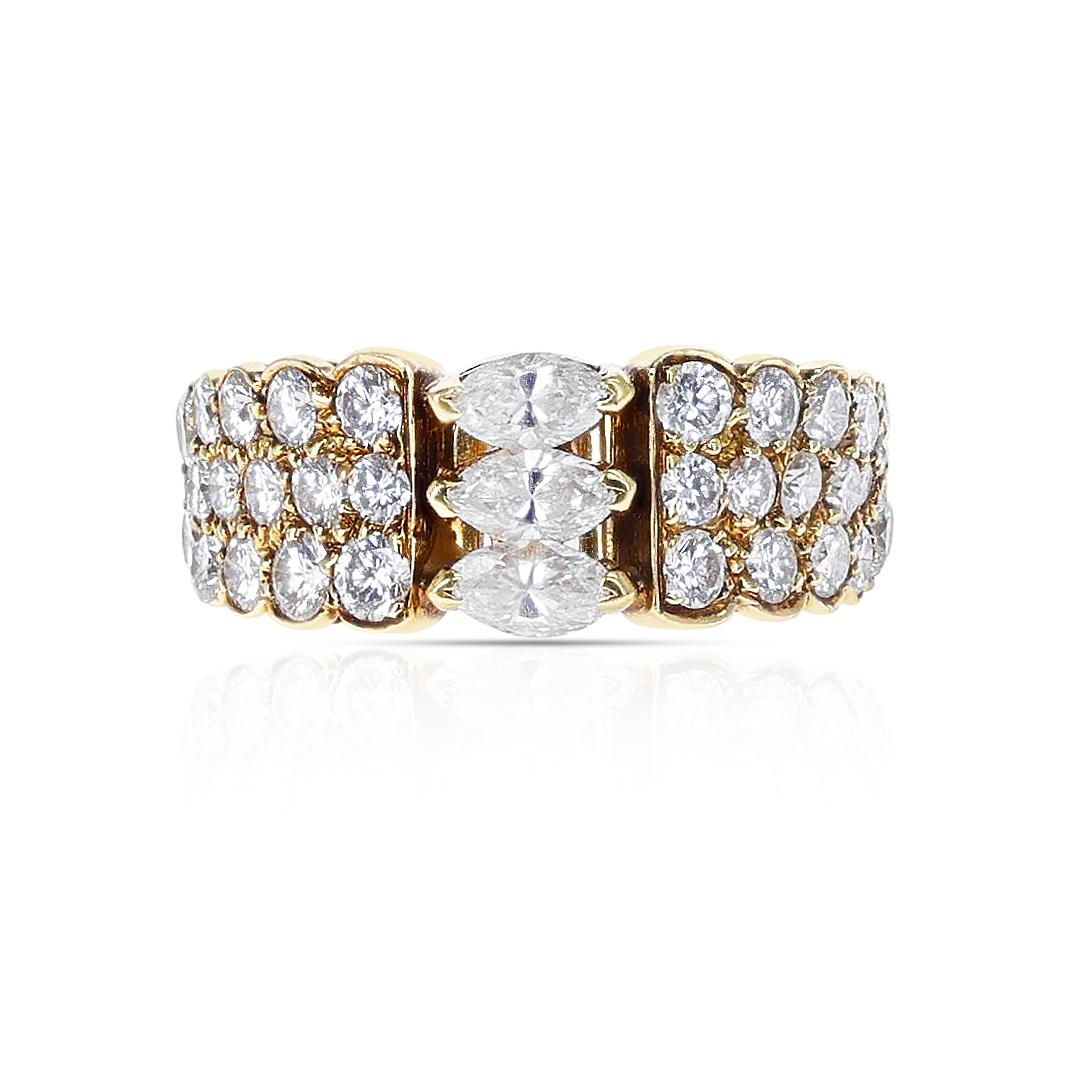 A beautiful and elegant Van Cleef & Arpels Three Marquise Diamonds with Round Diamonds Engagement Ring made in 18 Karat White Gold. The total weight is 4.49 grams. The ring size is US 6.50. 

SKU: 572-MPCFEJQW
