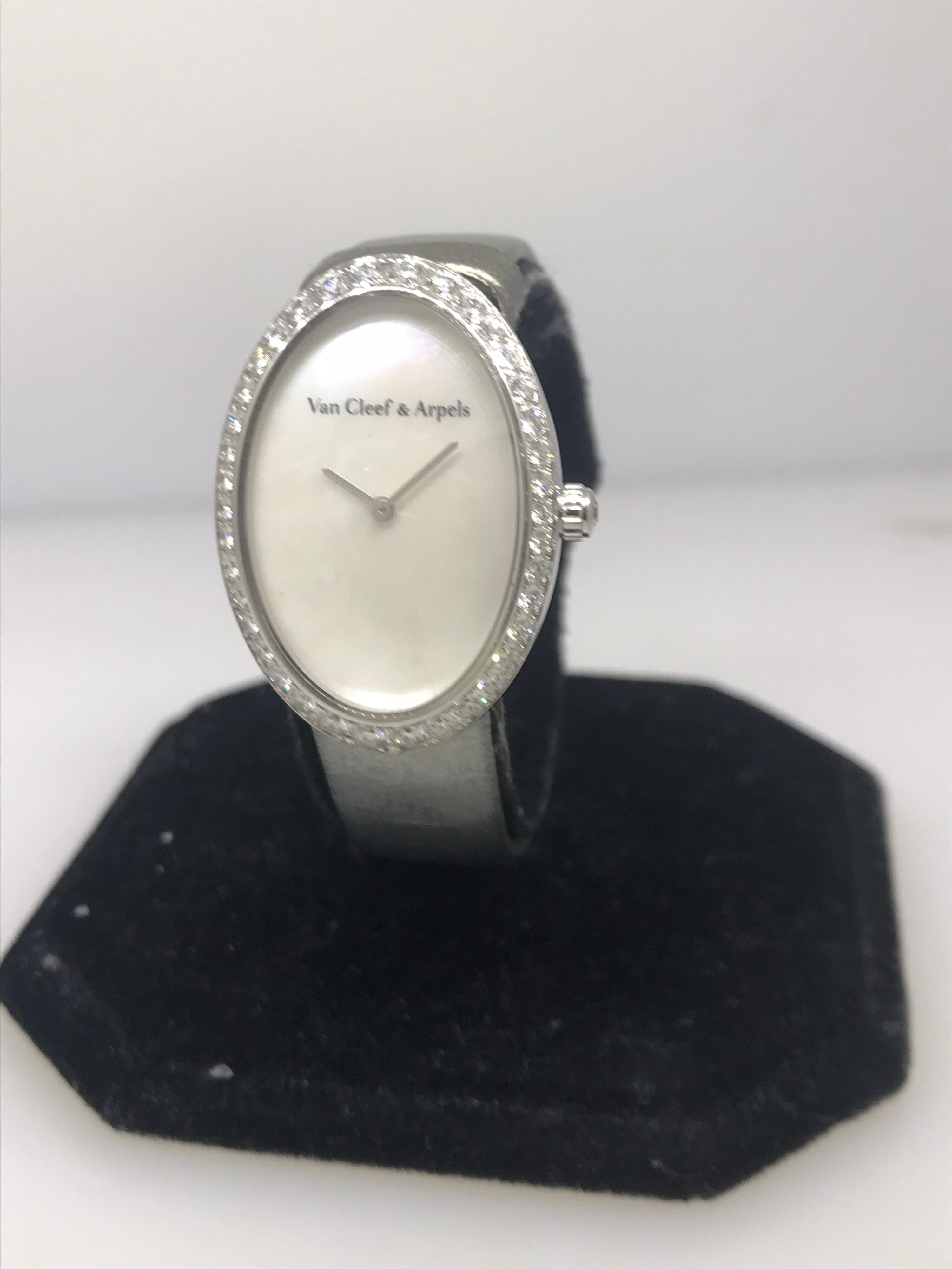 Van Cleef & Arpels Timeless Watch

Model Number: WJWF01I9

100% Authentic

Brand New

Comes with original Van Cleef & Arpels Box 

18 Karat White Gold Case & Buckle

Diamond Bezel

White Mother of Pearl Dial

Case Dimensions: 22mm x 34mm

Gray Satin