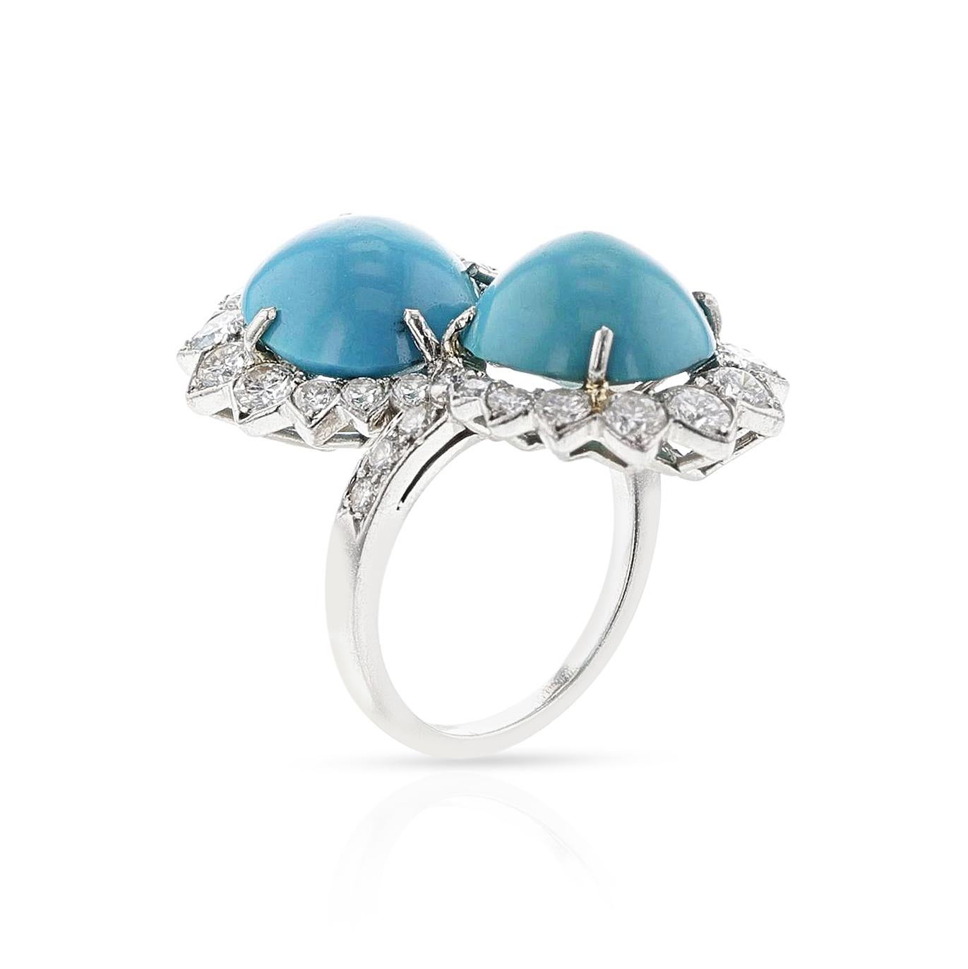 A Van Cleef & Arpels Toi et Moi Turquoise and Diamond Ring made in Platinum. Circa 1960s. The total weight of the diamonds is appx. 2.25 carats. The total weight is 11.07 grams. The ring size is US 5.50. The length of the top of the ring is 1.15