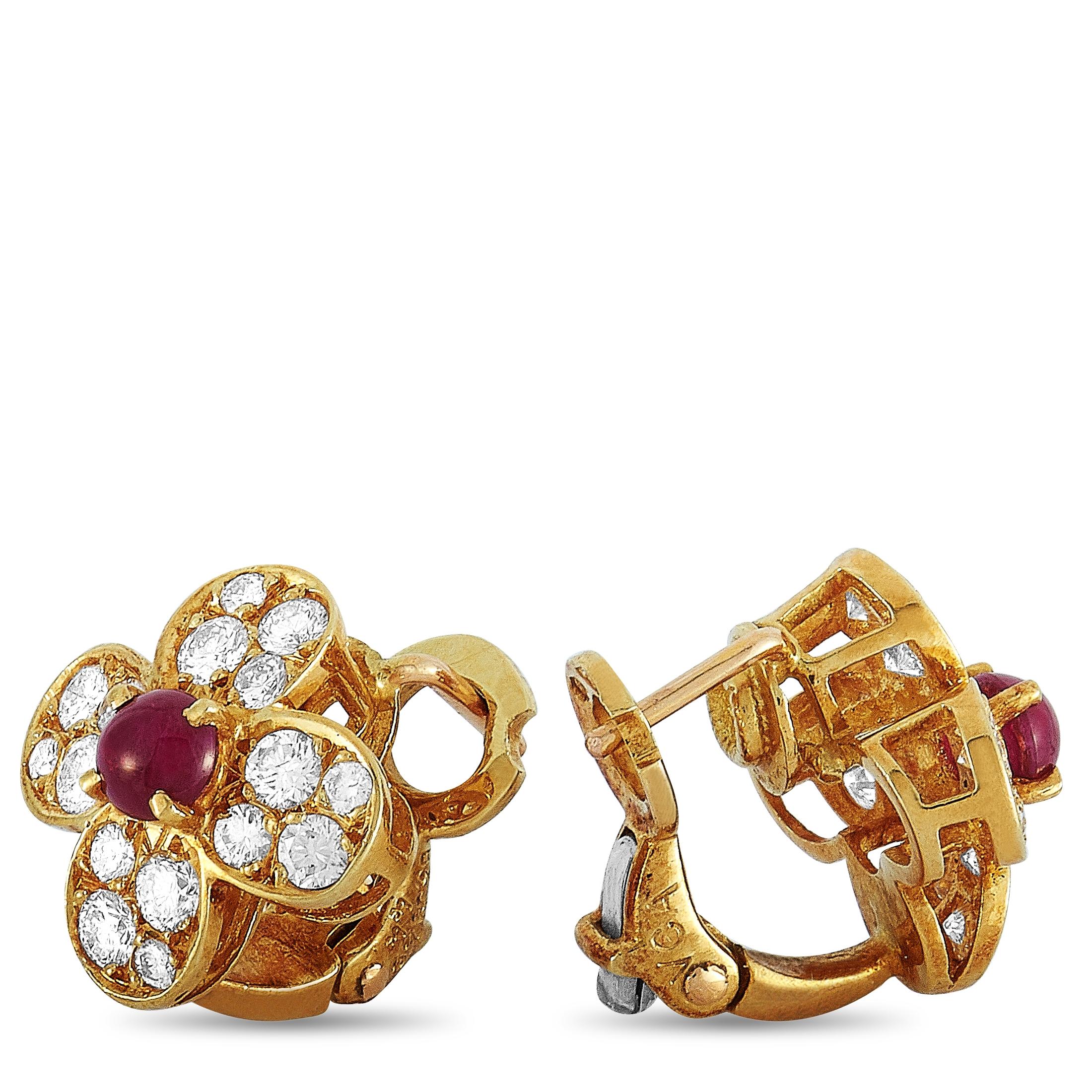 The Van Cleef & Arpels “Trefle” earrings are made of 18K yellow gold and each weighs 3.3 grams, measuring 0.60” in length and 0.60” in width. The earrings are embellished with rubies and a total of 0.82 carats of diamonds that boast grade E color