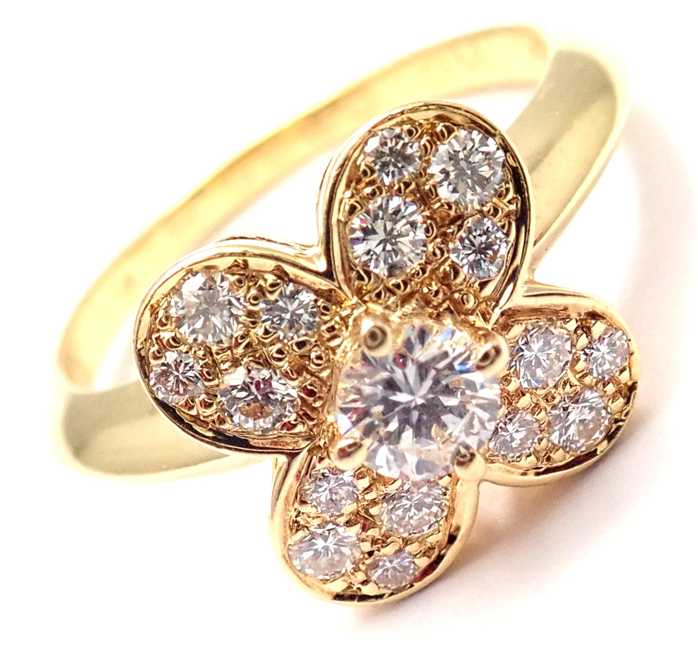 18k Yellow Gold Diamond Trefle Clover Ring by Van Cleef & Arpels.
With 17 round brilliant cut diamonds approx .75ct total weight VS1 clarity, G color
This ring comes with Van Cleef & Arpels certificate of authenticity and a box.
Details:
Size:
