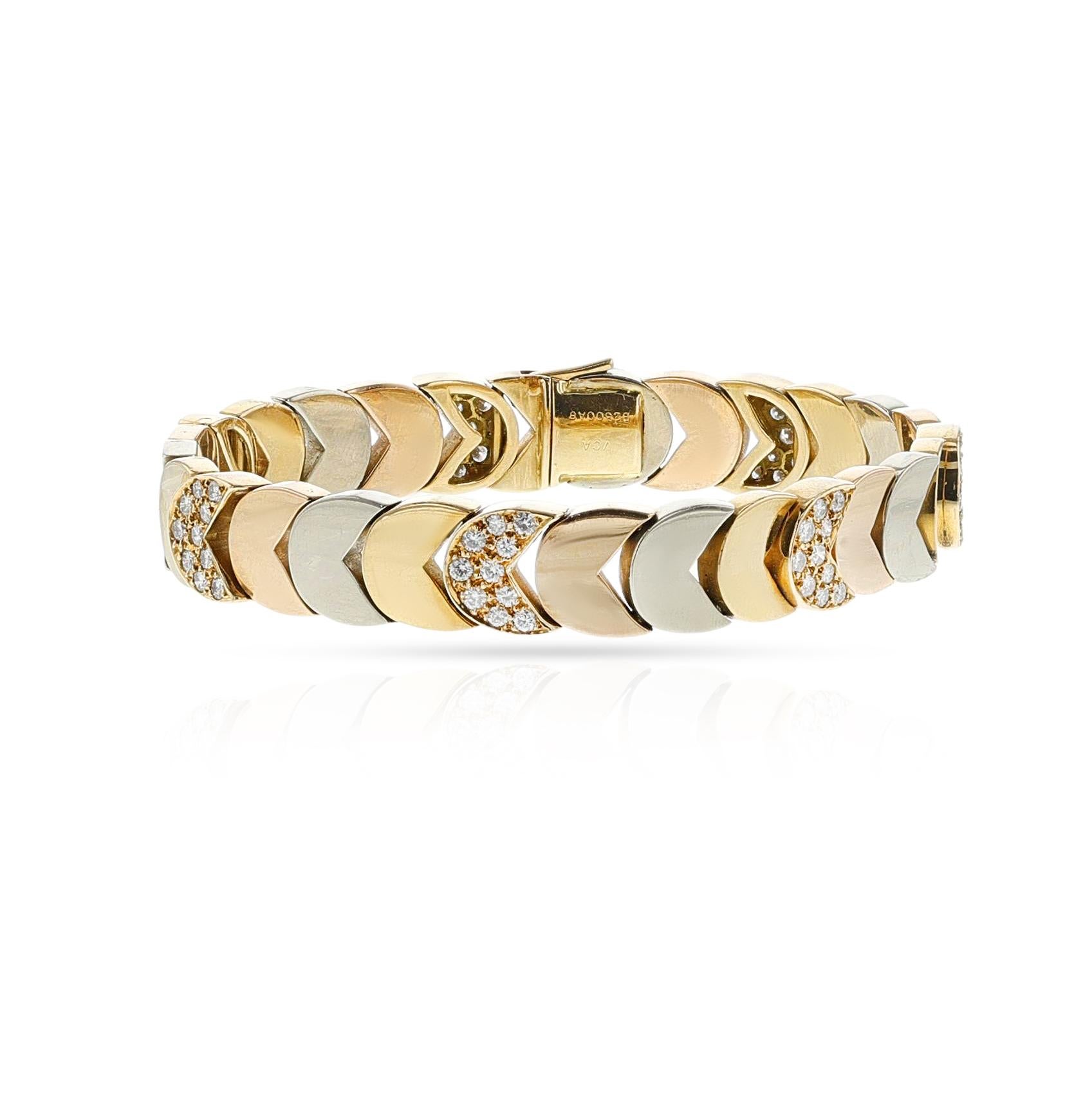 Taille ronde Van Cleef & Arpels, bracelet en or tricolore et diamants Georges L'enfant, 18 carats en vente