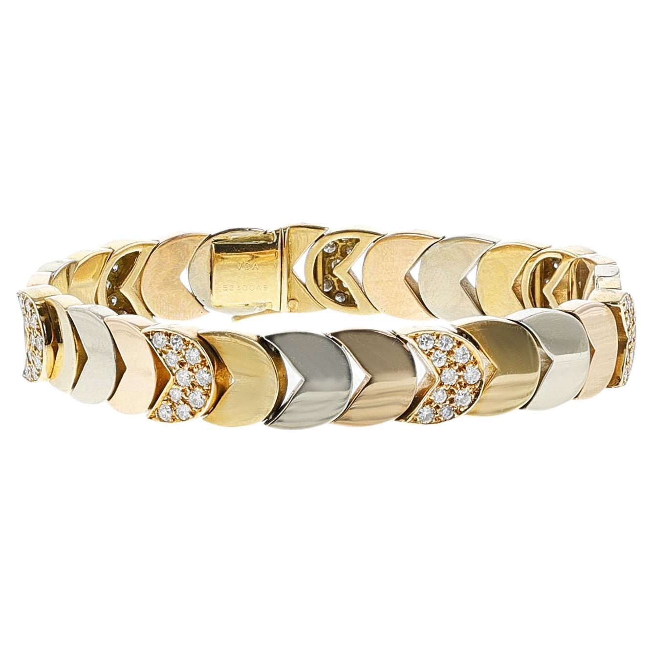 Van Cleef & Arpels, bracelet en or tricolore et diamants Georges L'enfant, 18 carats en vente