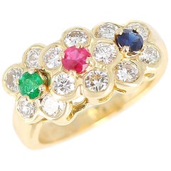 Van Cleef & Arpels Tri-Floral Emerald, Ruby, Sapphire and Diamond Ring