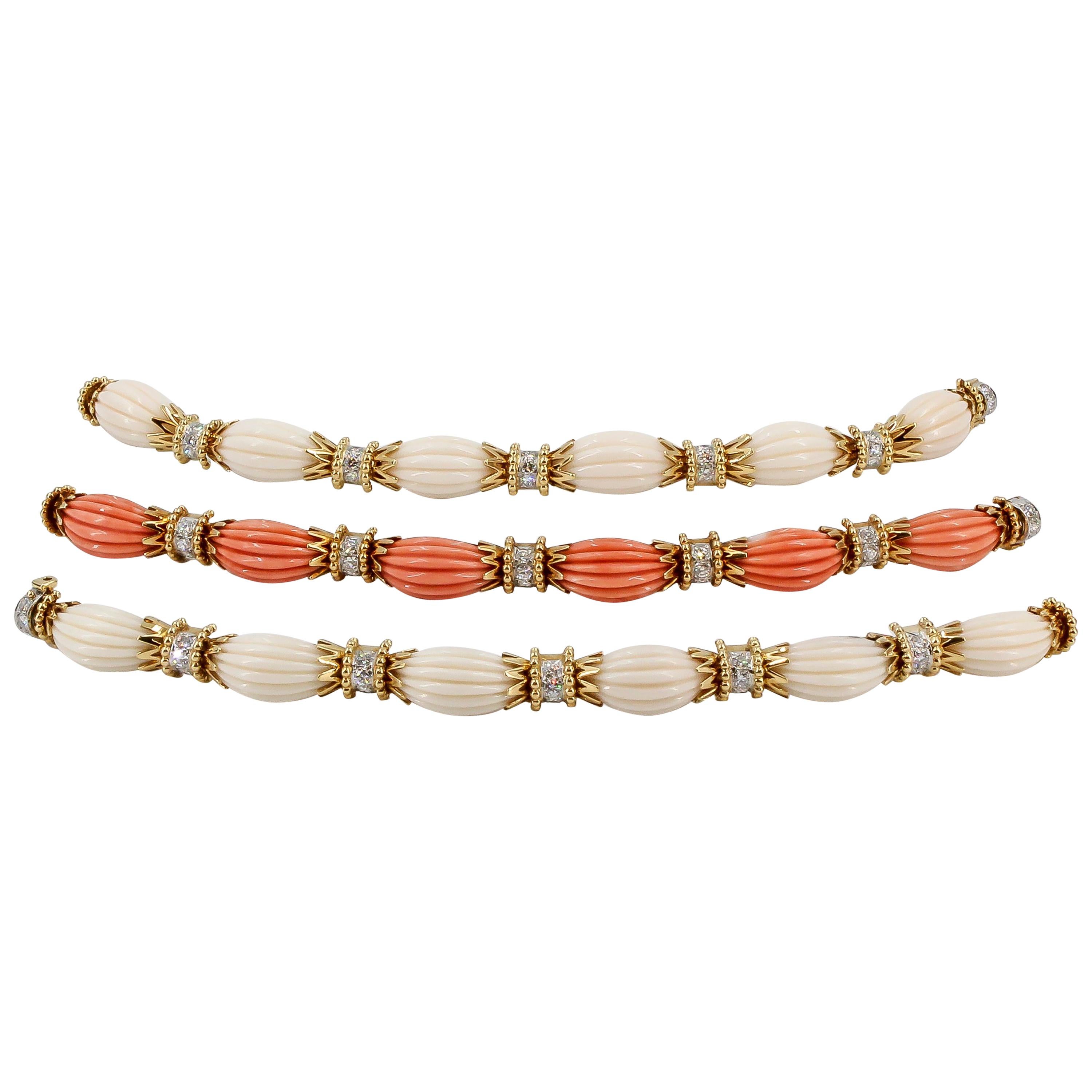 Fine set of 3 diamond and coral bracelets set in 18K gold & platinum, by Van Cleef & Arpels, circa 1960s-70s. Very rare to find one in good condition, let alone three.  The white and salmon pink coral compliment each other wonderfully. They feature