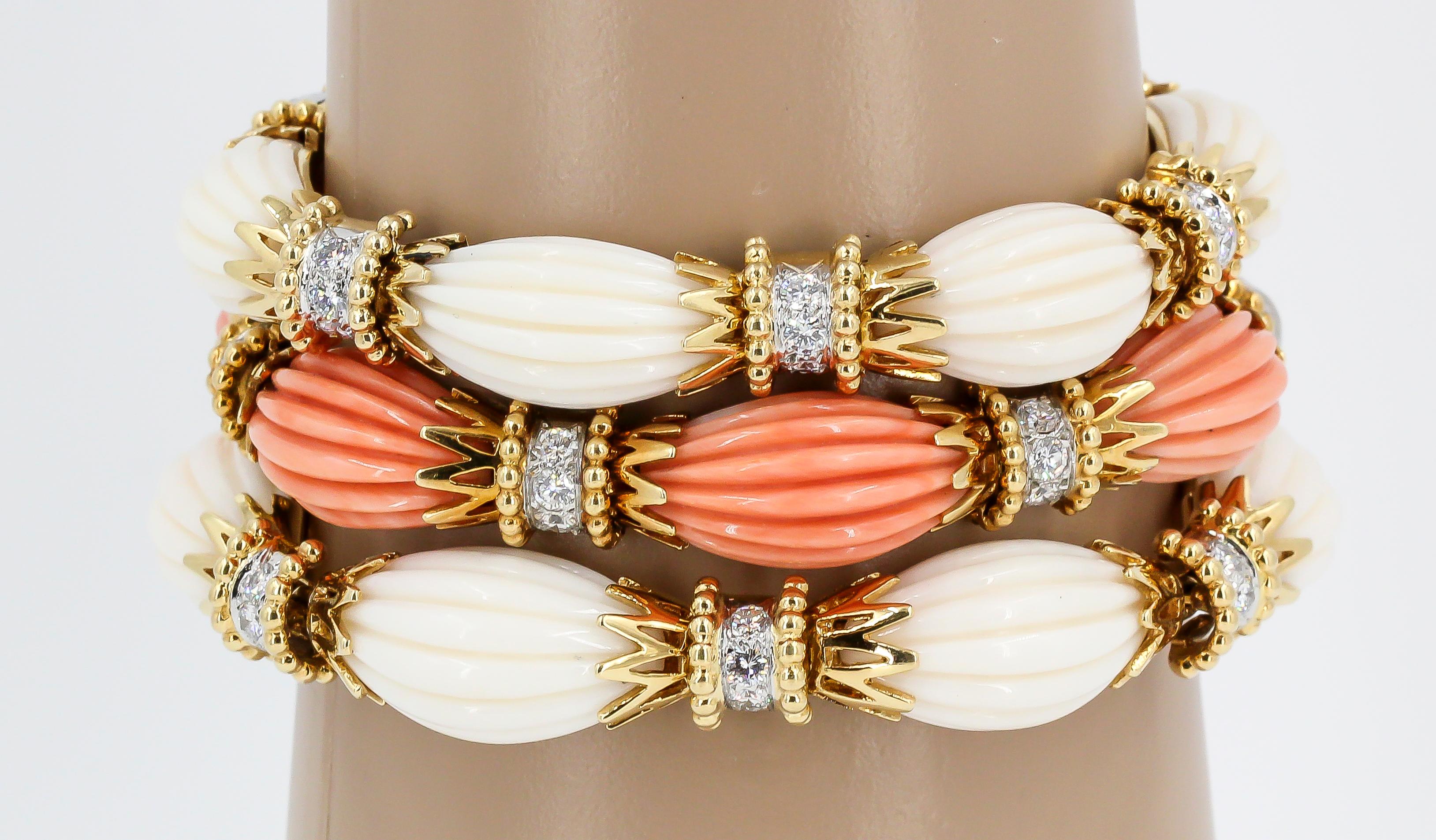 Impressive trio of diamond and coral bracelets set in 18K gold & platinum, by Van Cleef & Arpels, circa 1960s-70s. Very rare to find one in good condition, let alone three.  The white and salmon pink coral compliment eachother wonderfully. They