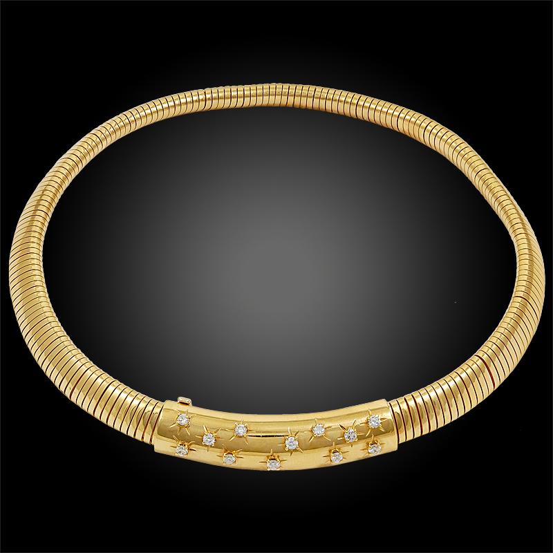 Van Cleef & Arpels Tubogas Passe-Partout Constellation Necklace in 18k Yellow Gold.

A notable necklace by Van Cleef & Arpels dating from the early years of the iconic Passe-Partout collection. This piece features a tubogas chain with a hidden clasp