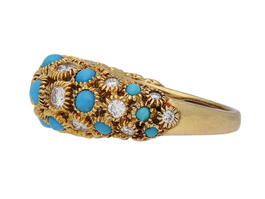 Van Cleef & Arpels turquoise and diamond Sultana ring. Set with eighteen round cabochon natural turquoise of varying sizes in open back rubover settings with an approximate combined weight of 0.70 carats, further set with nineteen round old cut