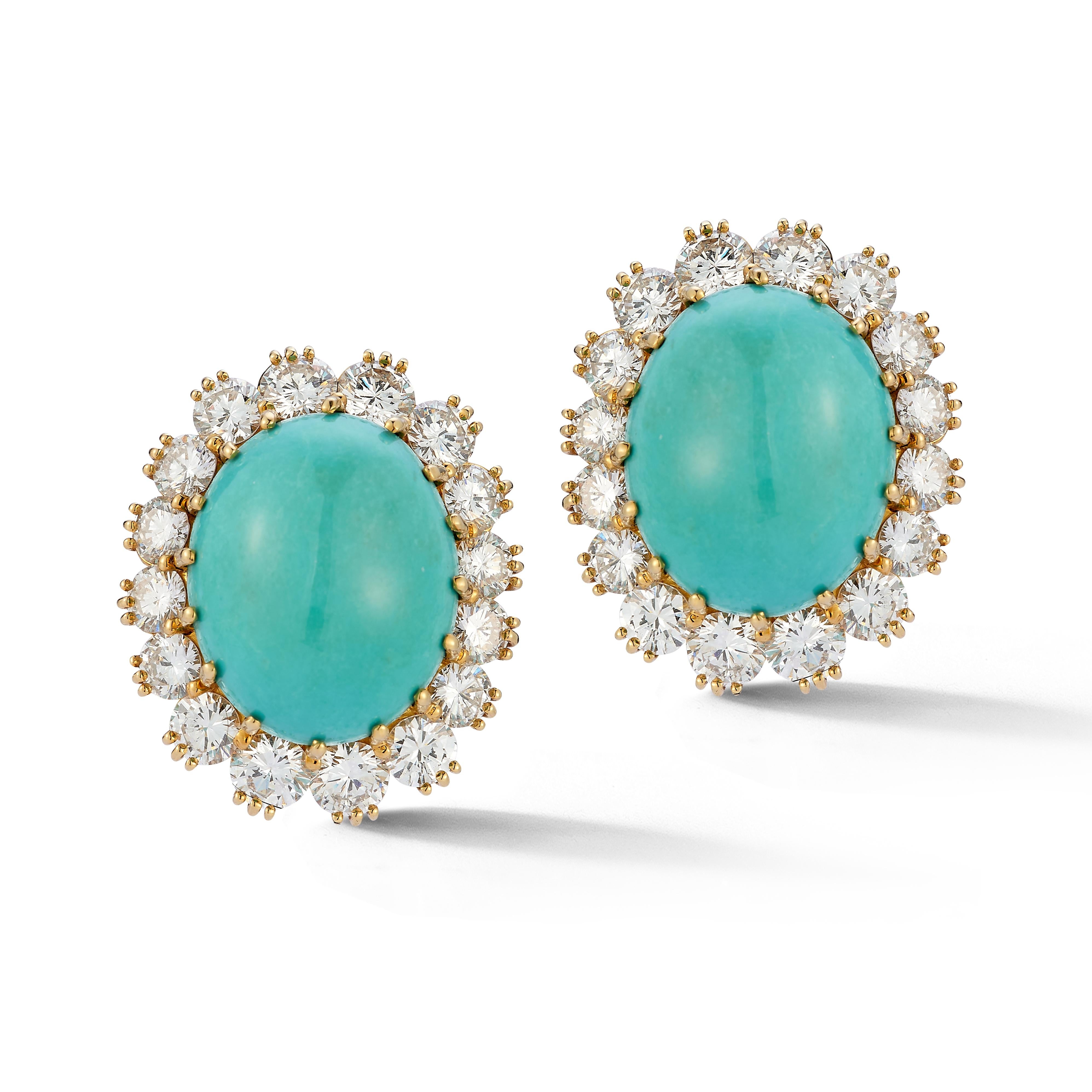 Van Cleef & Arpels Turquoise & Diamond Earrings

A pair of 18 karat yellow gold earrings each set with a halo of round cut diamonds with central cabochon turquoise  

Signed Van Cleef & Arpels N.Y. and numbered

Length: 1