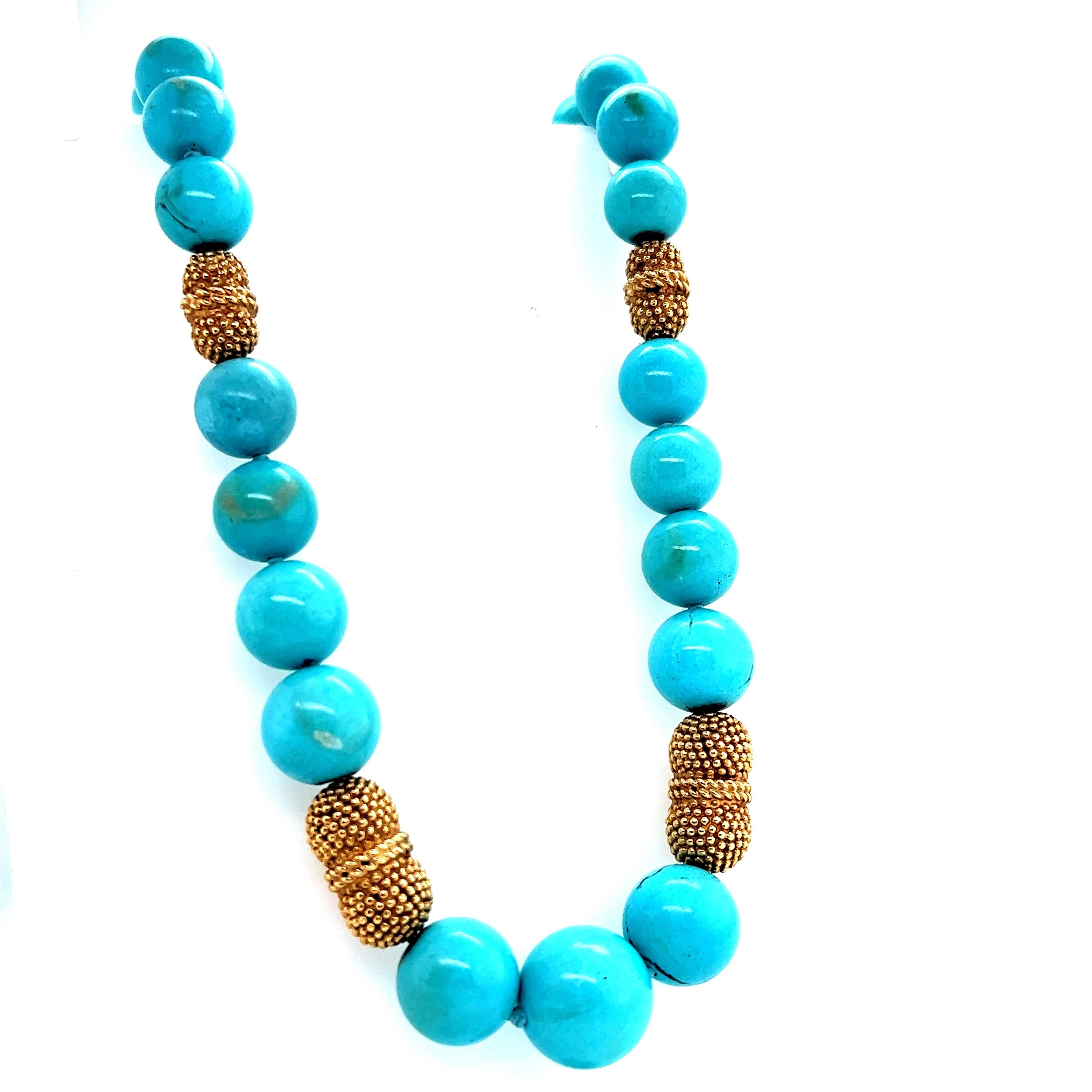 Fantastic design seen by famed jewelry house Van Cleef & Arpels. This vintage necklace is composed of natural turquoise bead gemstones. The beads measure 7.5 mm in the back of the necklace and graduate to 15 mm in the front of the design.  The