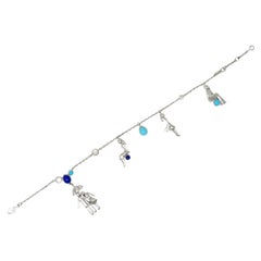 Van Cleef & Arpels Turquoise Lapis Lazuli Moonstone Diamond 18 Karat Bracelet