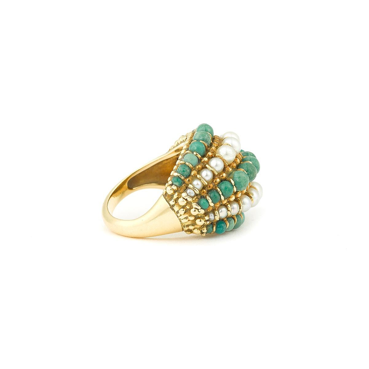 A Rare and exceptionnal VAN CLEEF & ARPELS twist ring.
Made of 18K Yellow Gold turquoise and Cultured Pearl.

Signed VCA and numbered : VCA 750 62-99204

Good conditions. (minor scratches)

Rare and Just gorgeous!

Circa 1960/70
French Work 

Size