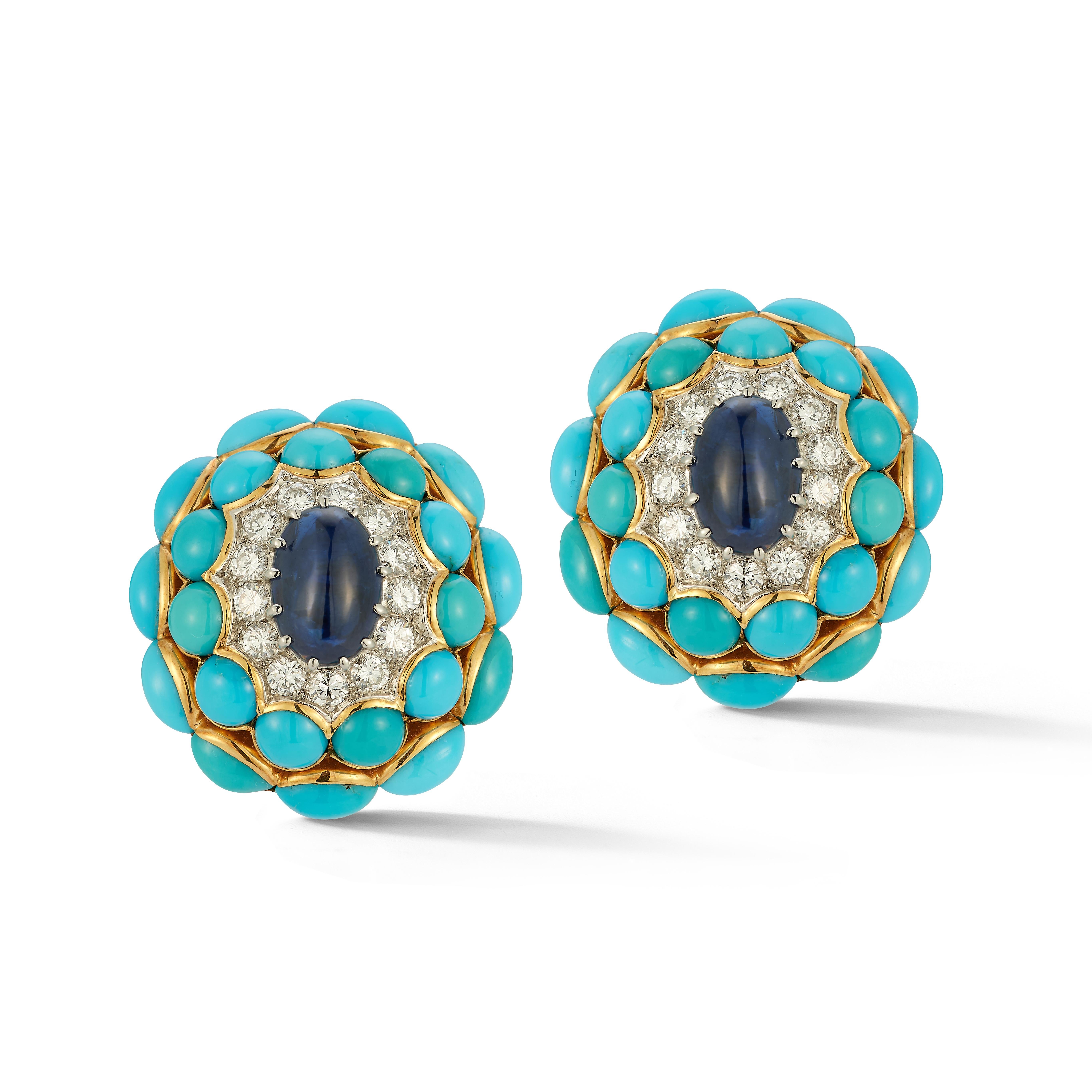 Large Size Van Cleef & Arpels Turquoise & Sapphire Earrings

A pair of 18 karat yellow gold earrings each set with a central cabochon sapphire framed by 13 round cut diamonds and 2 rows of cabochon turquoises 

Signed VCA and numbered

Circa