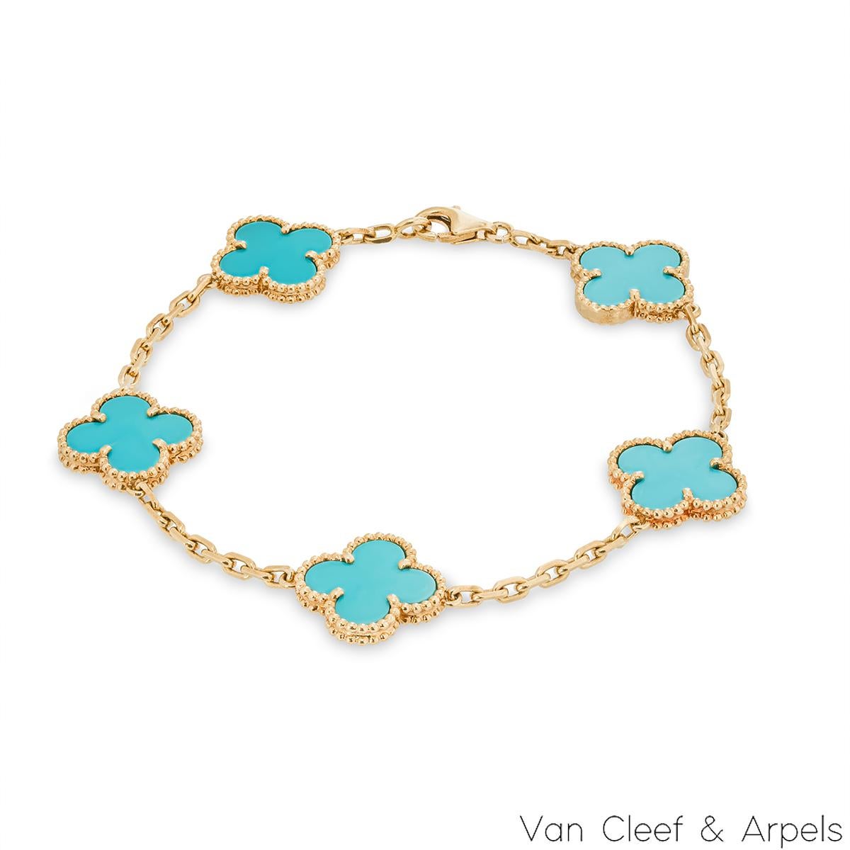 A rare 18k yellow gold turquoise bracelet by Van Cleef & Arpels from the Vintage Alhambra collection. The bracelet features 5 iconic 4 leaf clover motifs, each set with a beaded edge and a turquoise inlay, set throughout the length of the chain. The
