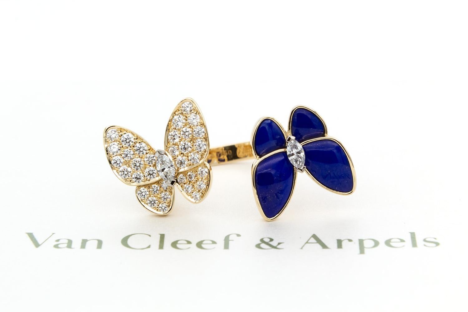 We are pleased to offer this beautiful Guaranteed Authentic Van Cleef & Arpels Two Butterfly Between The Finger Ring with original VCA inner and outer boxes & insurance valuation. Van Cleef & Arpels revisits one of its most treasured themes in the