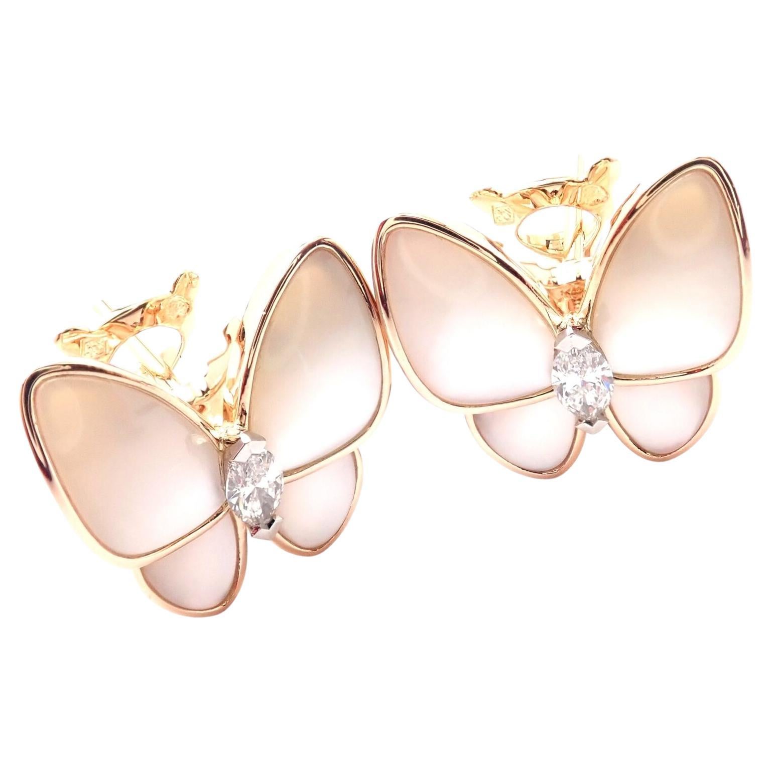 18k Rose Gold Two Butterfly Diamond And Mother Of Pearl  Earrings by Van Cleef & Arpels.
With 2 marque shape diamonds VVS1 clarity, E color total weight .31ct
8 Mother of pearl stones.
These earrings are for pierced ears.
These earrings come with