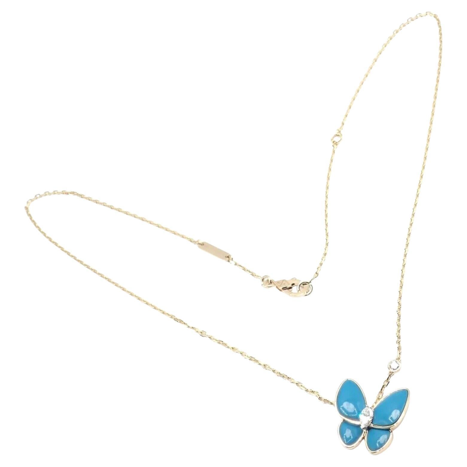 Van Cleef & Arpels Halskette mit Anhänger aus Gelbgold mit zwei Schmetterlings-Diamanten und Türkis in Gelbgold