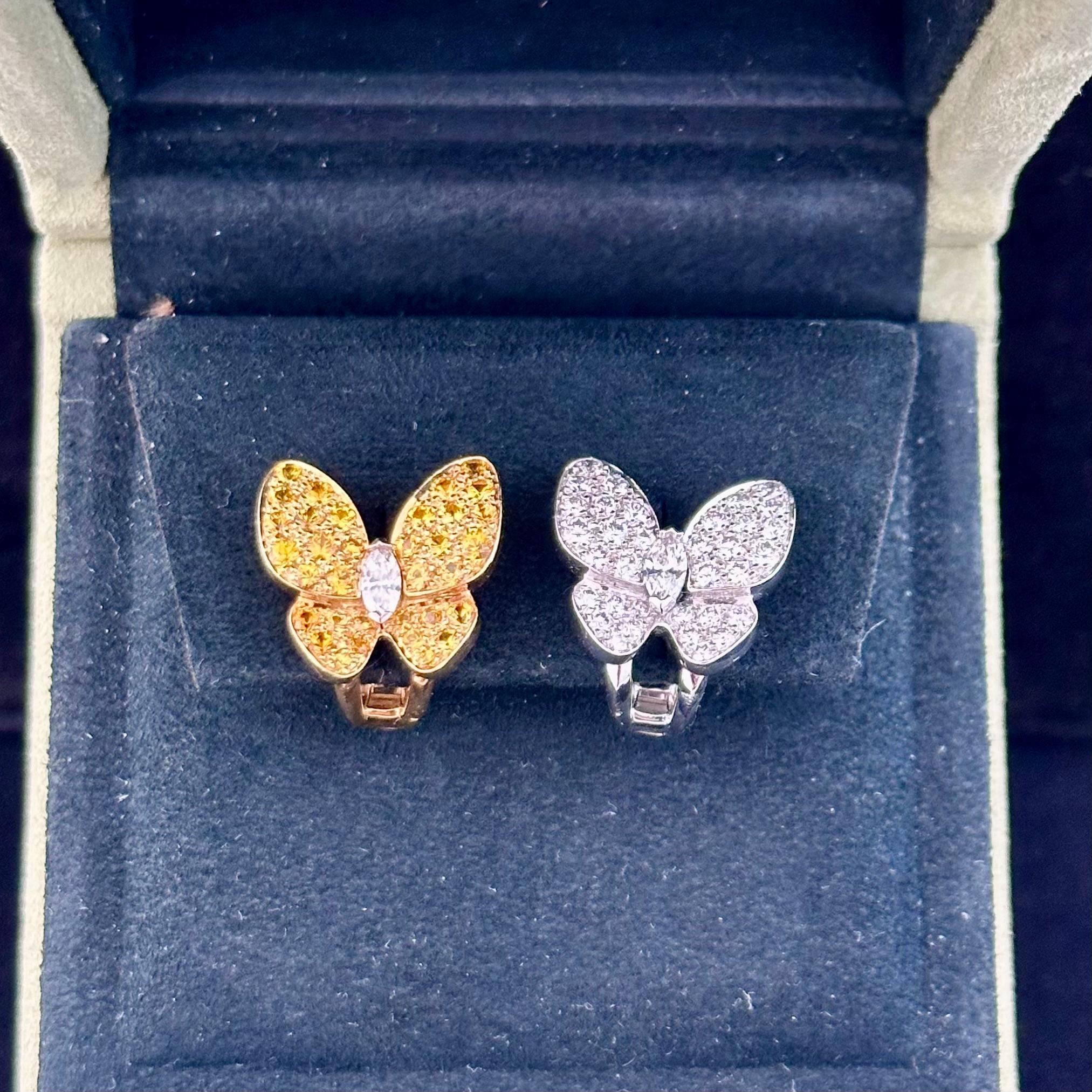 VCA: Two Butterfly earrings, 18K yellow gold, round yellow sapphires, rhodium plated 18K white gold, round and marquise-cut diamonds; diamond quality DEF, IF to VVS

REFERENCE
VCARB15100
STONE
STONE Diamond: 36 stones, 0.99 carat
STONE Sapphire: 34