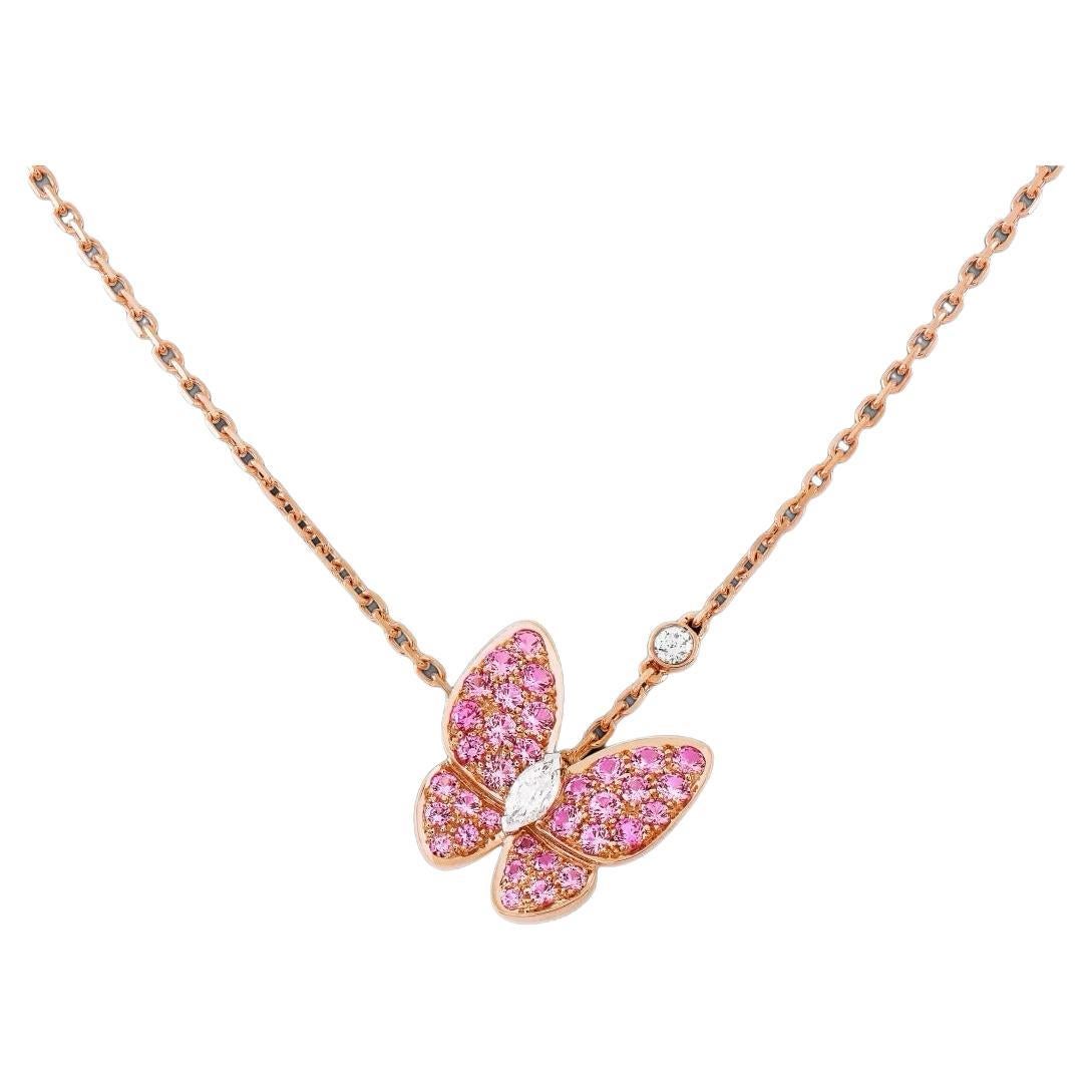 Van Cleef & Arpel’s Two Butterfly pink Sapphire and Diamond pendant.