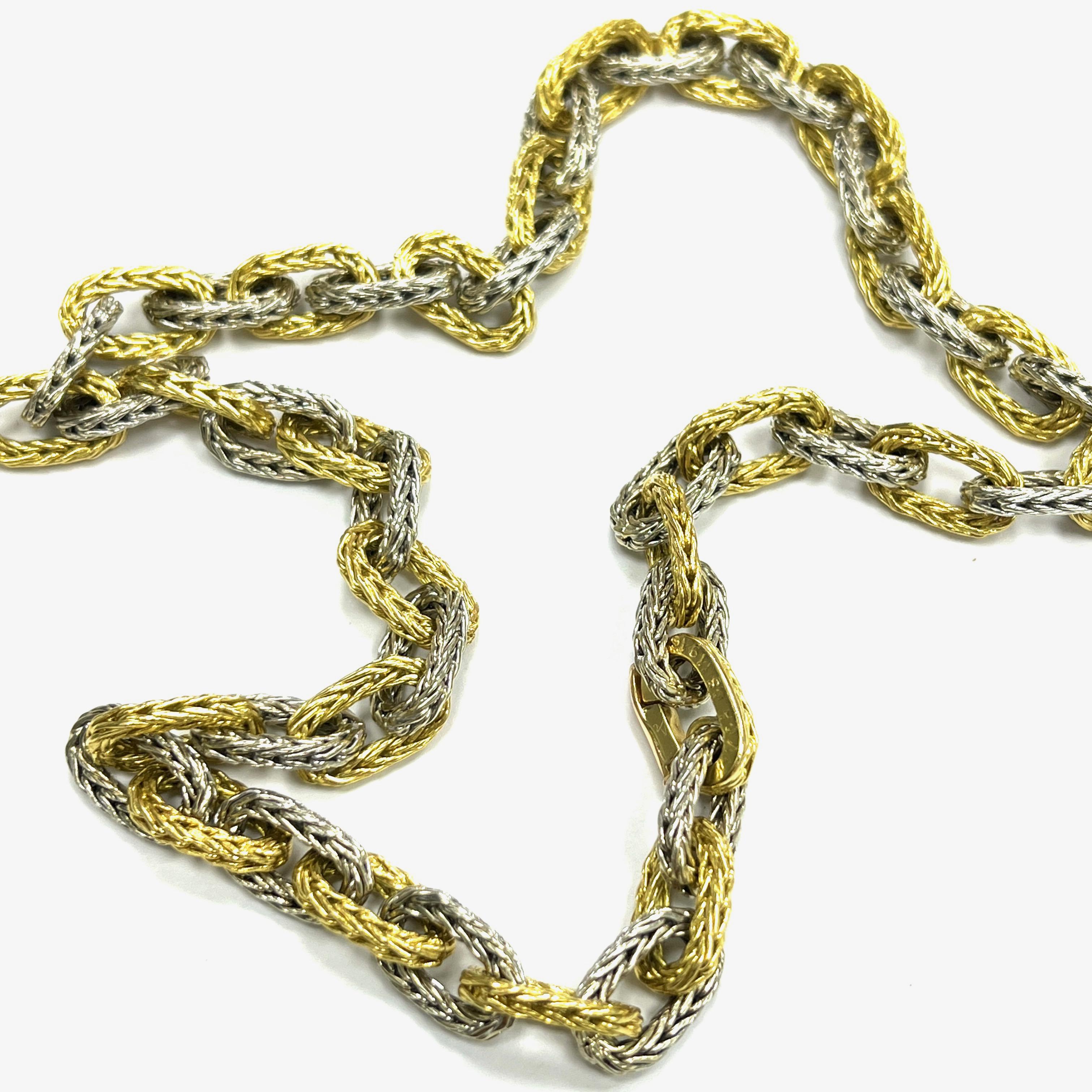 Van Cleef & Arpels two-tone gold chain collar necklace

Alternating 18 karat yellow and white gold; marked VCA, CS, 11916

Size: length 16.75 inches
Total weight: 61.1 grams