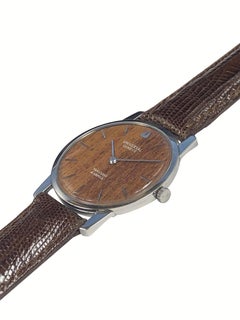Van Cleef & Arpels Universal Geneve Holz-Armbanduhr mit mechanischem Zifferblatt aus Stahl