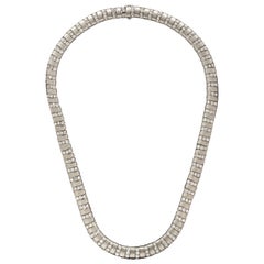 Van Cleef & Arpels, collier inhabituel en platine brossé et diamants, circa 1942