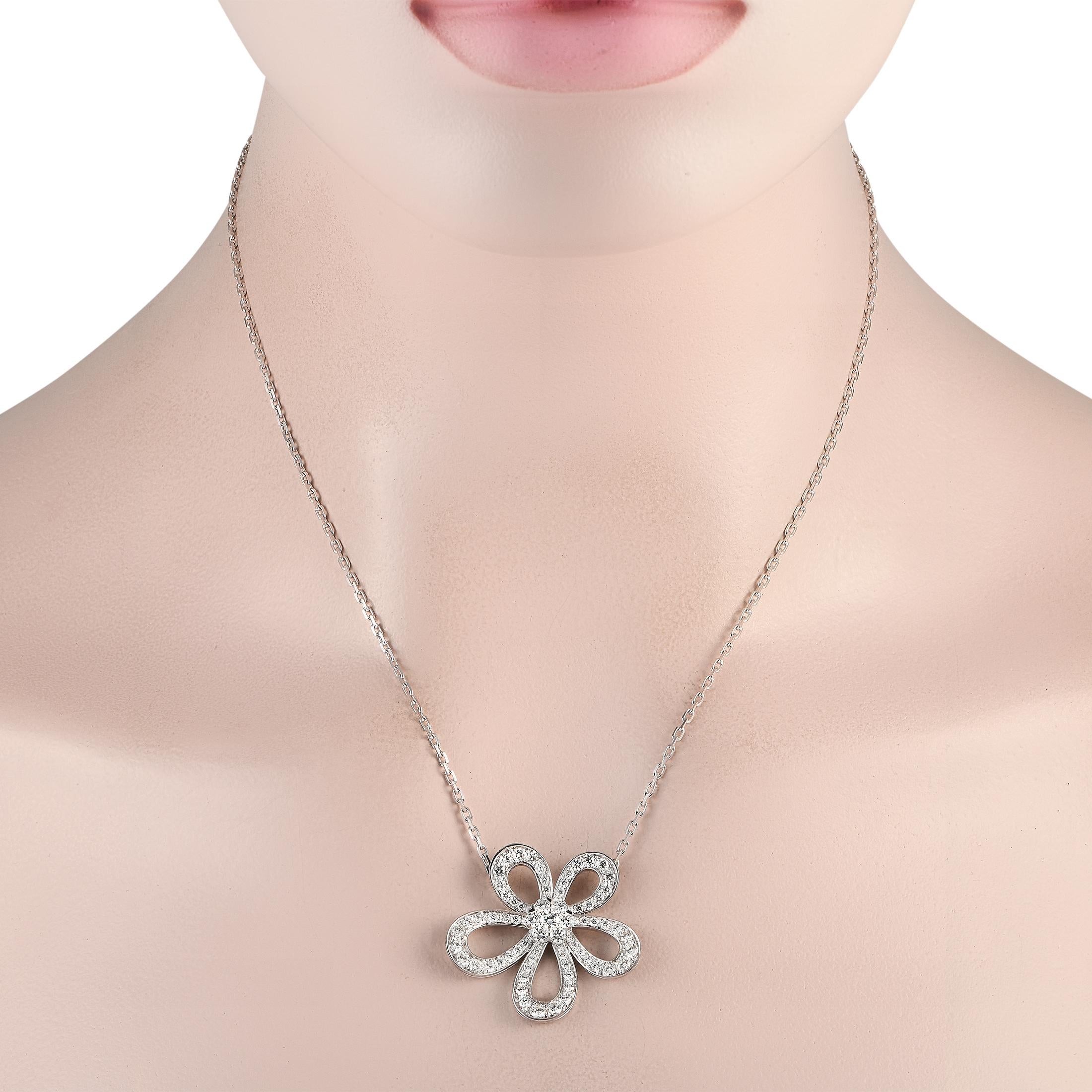A charming floral motif makes this Van Cleef & Arpels Flower Lace pendant simply unforgettable. Crafted from 18K White Gold, this piece features a flower shaped pendant measuring 1.15 long by 1.25 wide suspended from an 18 chain. Sparkling Diamonds