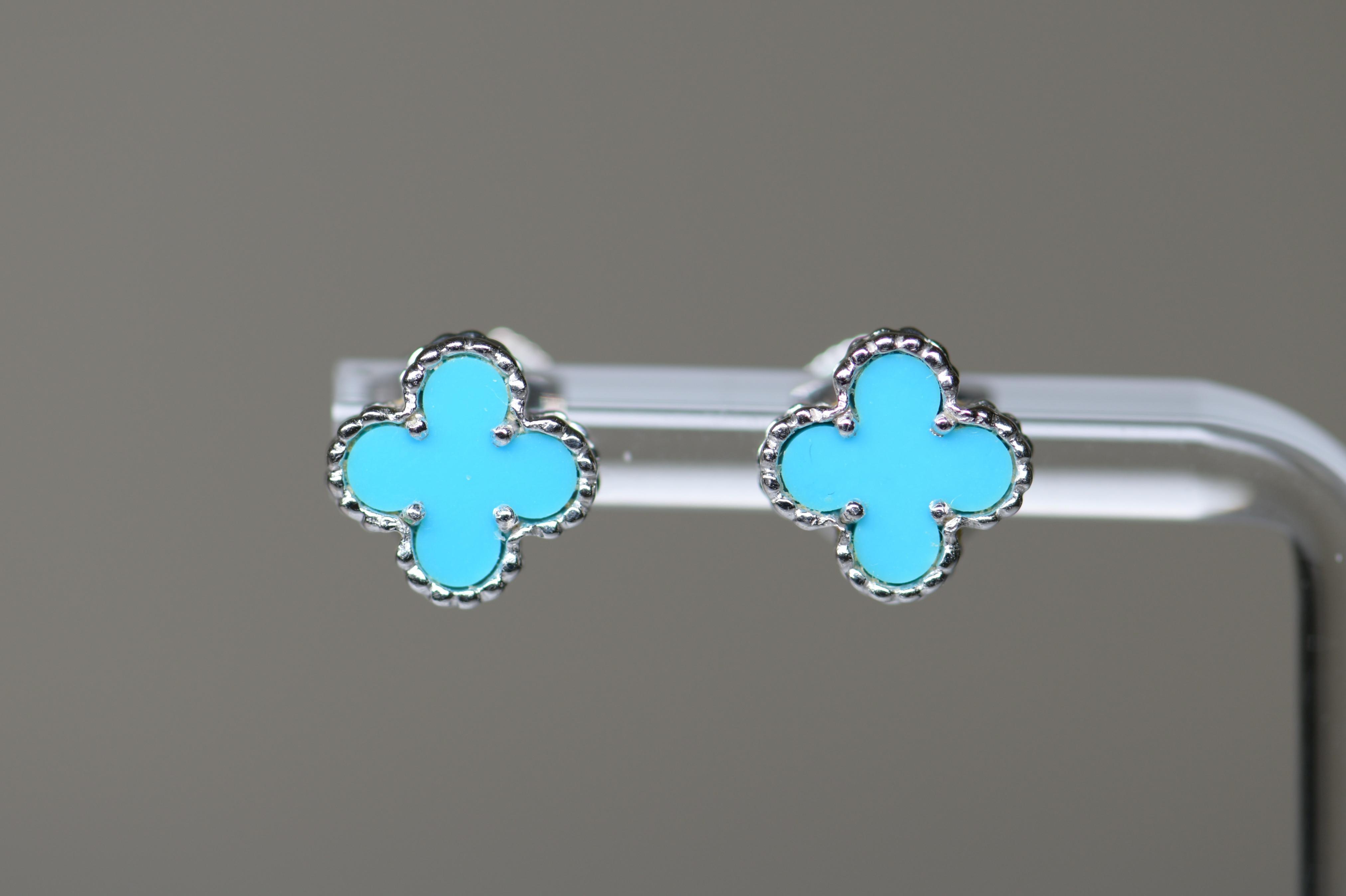 Van Cleef & Arpels sweet turquoise Alhambra 18K white gold earstuds. It is a very rare piece, you won't find this come to the market very easy. Truly a rare collecting piece. This lovely piece comes with an original pouch and original box. 

Van