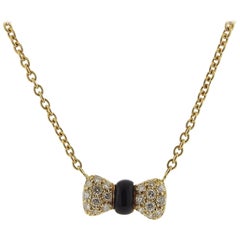 Van Cleef & Arpels VCA Gold Diamond Onyx Bow Pendant Necklace