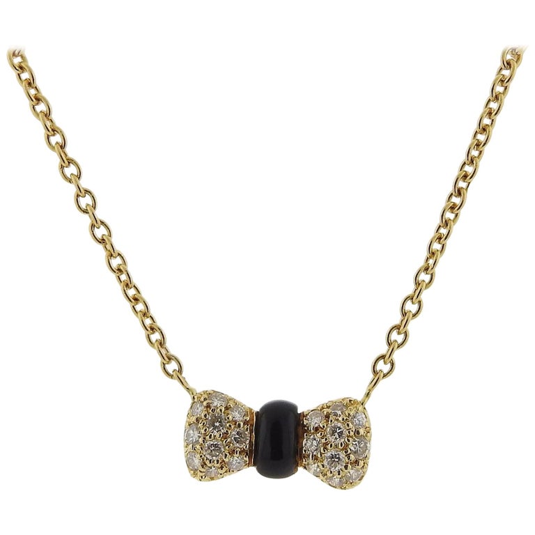 Van Cleef and Arpels VCA Gold Diamond Onyx Bow Pendant Necklace at