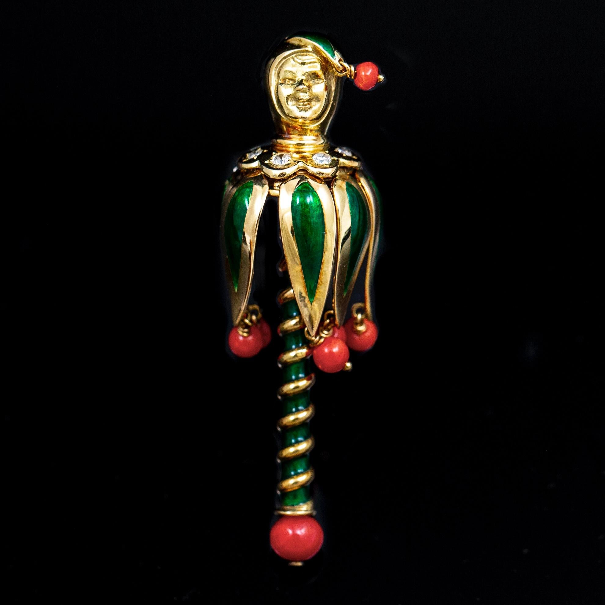 Van Cleef & Arpels (VCA) Mid-Century Jester diamond, coral and green enamel clip brooch in 18kt yellow and white gold, France, in maker’s case, circa 1960. Identical brooch formerly in collection of the Duchess of Windsor. Made by Péry et Cie for