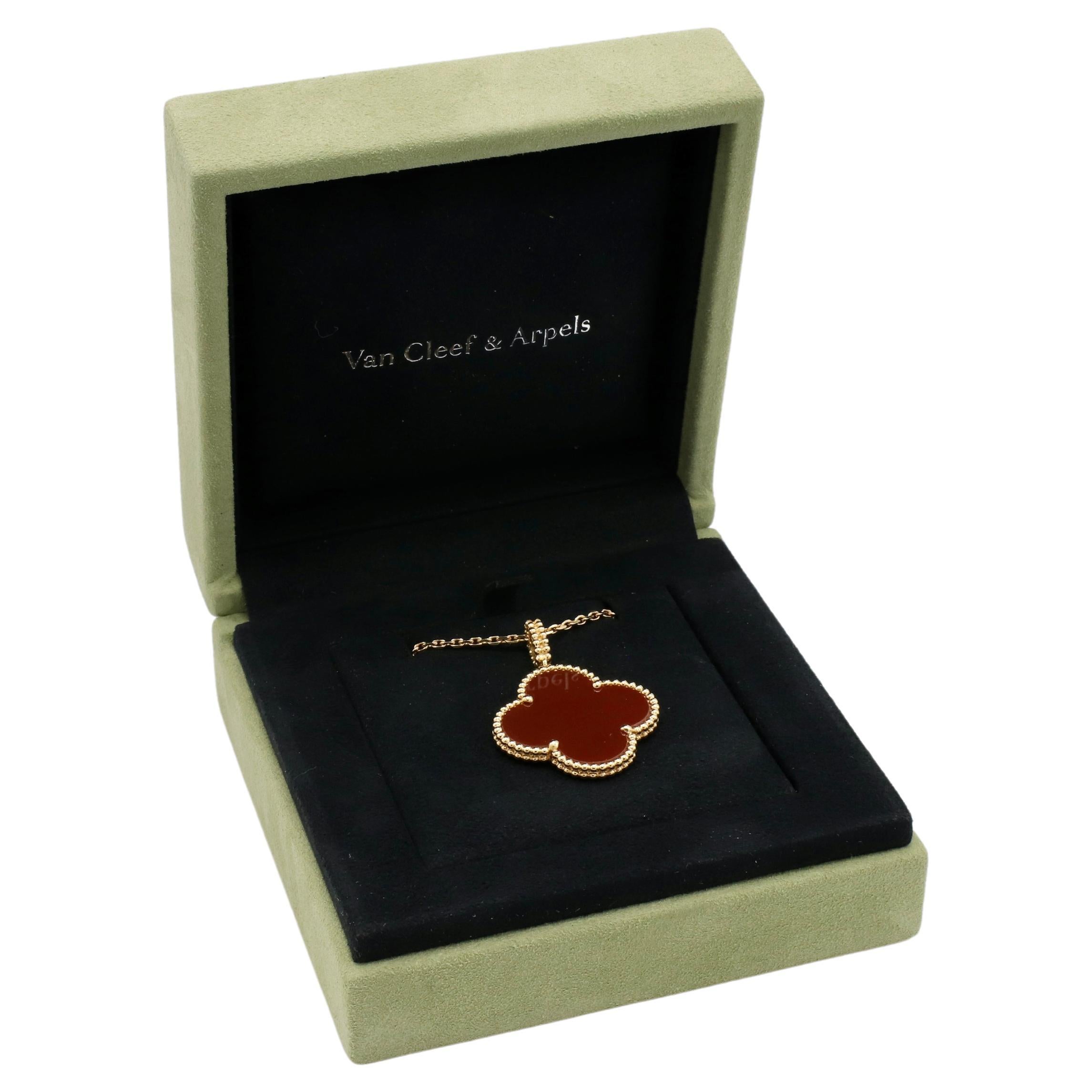 Van Cleef & Arpels VCA Magic Alhambra Carnelian Long Pendant Necklace
Metal: 18k yellow gold
Weight: 16.5 grams
Chain length: 35.43 inches
Pendant: 27mm
Retail: $6,950 USD
Notes: Original box 
Reference: VCARO49N00

