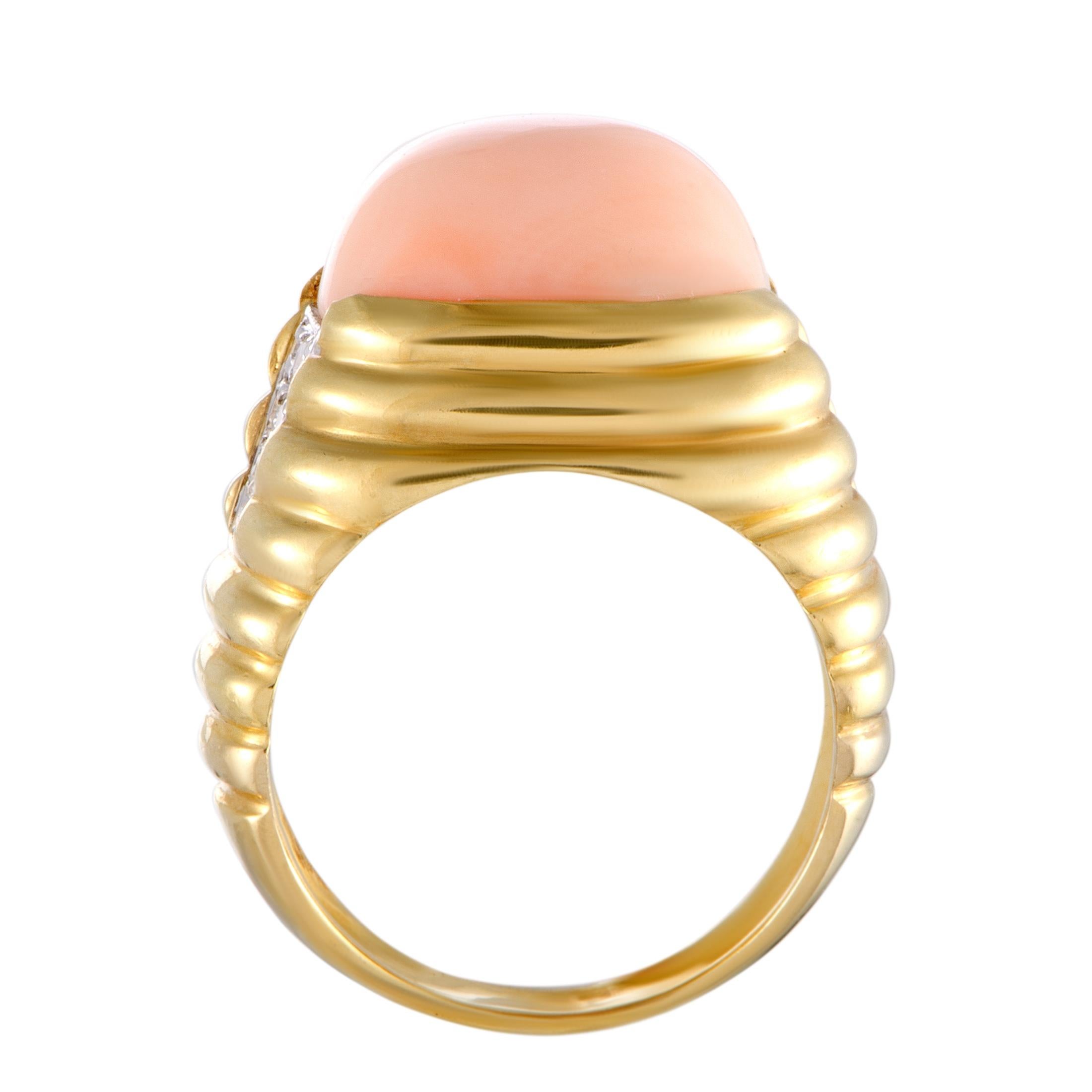 Designed in a splendidly sophisticated manner, this exquisite vintage ring from Van Cleef & Arpels will add a delightful touch of irresistible femininity to your look. The ring is crafted from 18K yellow and 18K white gold and it is decorated with a