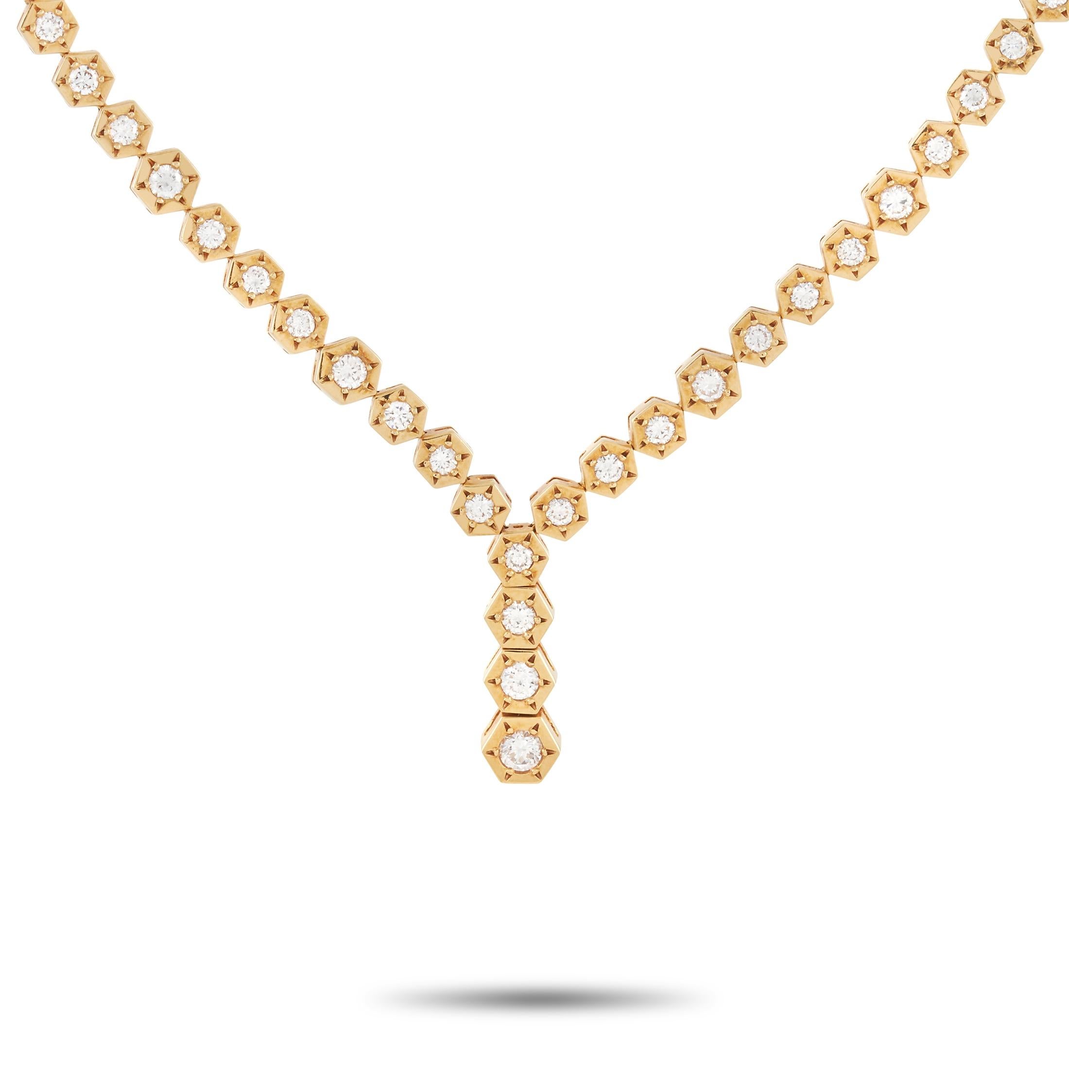 The Van Cleef & Arpels Vintage 18K Yellow Gold 3.46 ct Diamond Y Necklace is a unique necklace to be cherished for years. This piece is made up of hexagonal links in 18K yellow gold forming a Y-shaped necklace. A total of 3.46 carats of E-VVS