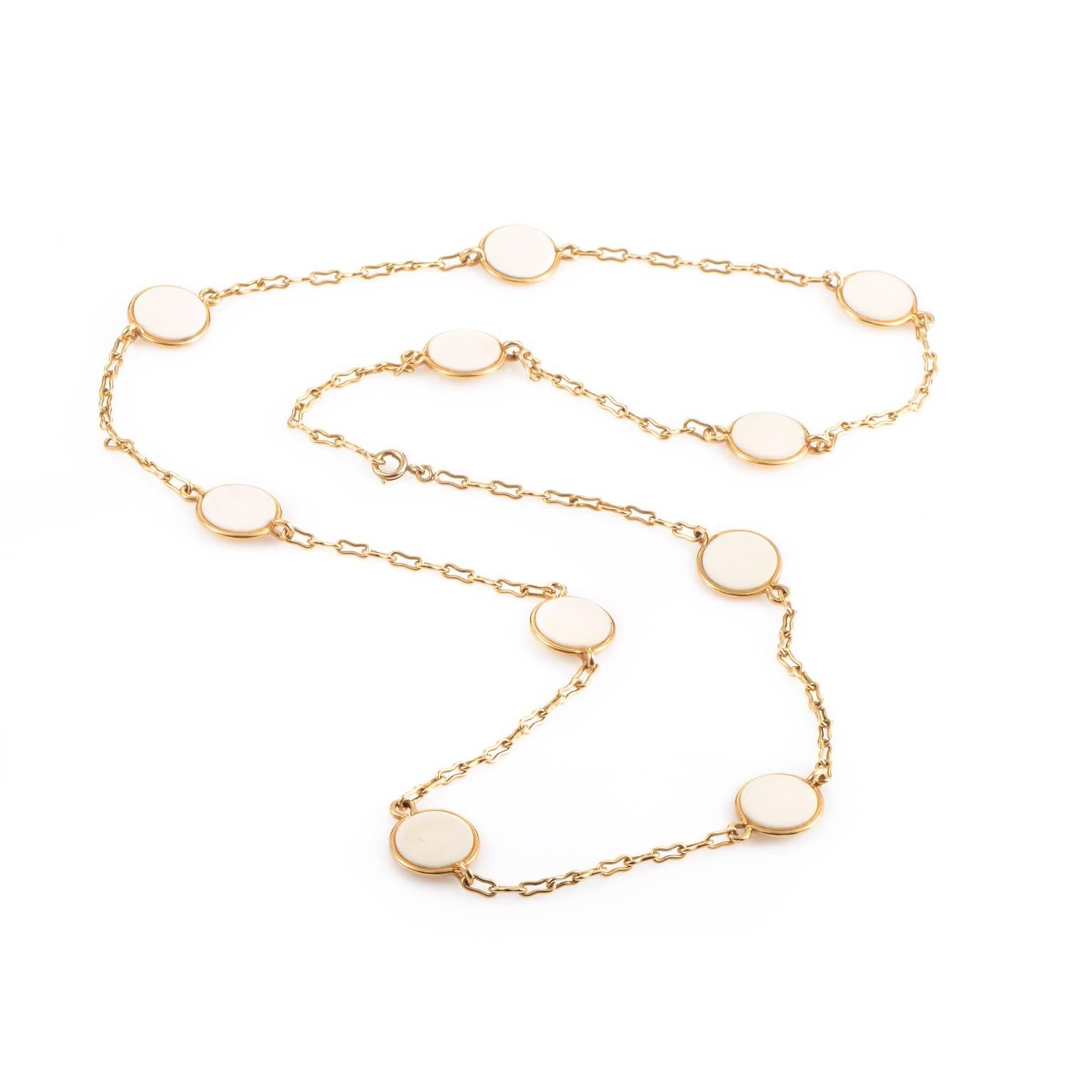 A simple yet sophisticated piece that is uncomplicated yet nuanced in its design, this vintage 1970's 18K yellow gold and rounded ivory necklace by Van Cleef and Arpels is a gorgeous example of meticulous craftsmanship.<br />Ivory Dimensions: 15 x