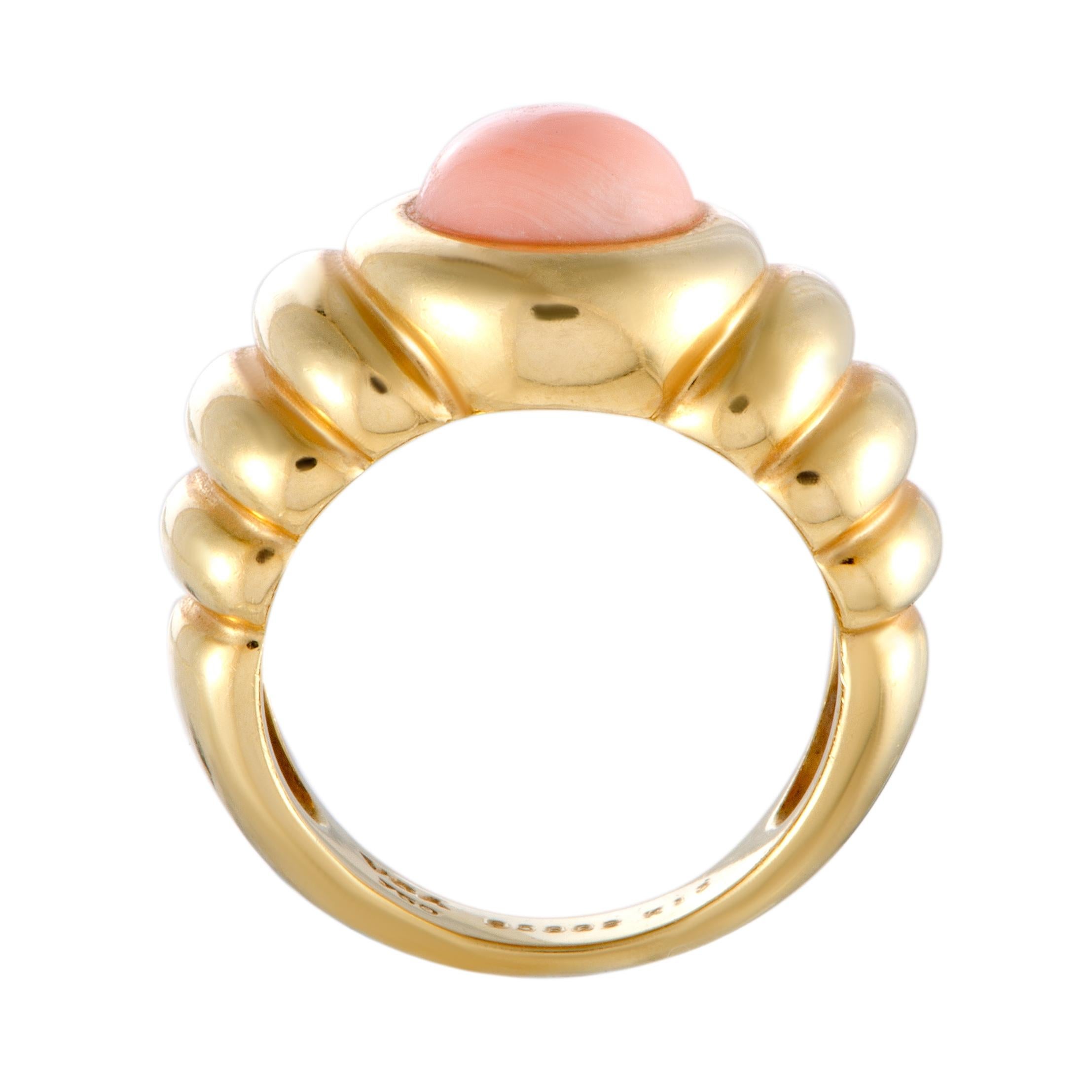 The sublime coral is given a distinctly luxurious appeal by the gleaming 18K yellow gold in this gorgeous ring that offers a delightfully feminine look. The ring is a vintage piece designed by Van Cleef & Arpels.
Ring Size: 6.5
Included Items: