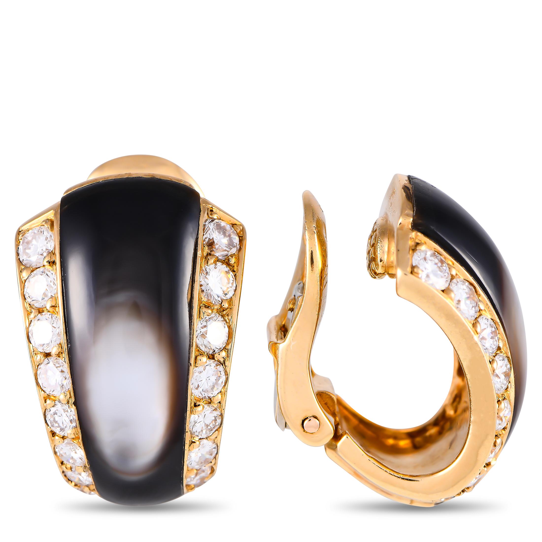Sleek mother of pearl gemstones make a statement at the center of these sophisticated Van Cleef & Arpels earrings. Crafted from 18K yellow gold, diamonds with a total weight of 1.14 carats make them even more captivating. Each one measures 0.75 long