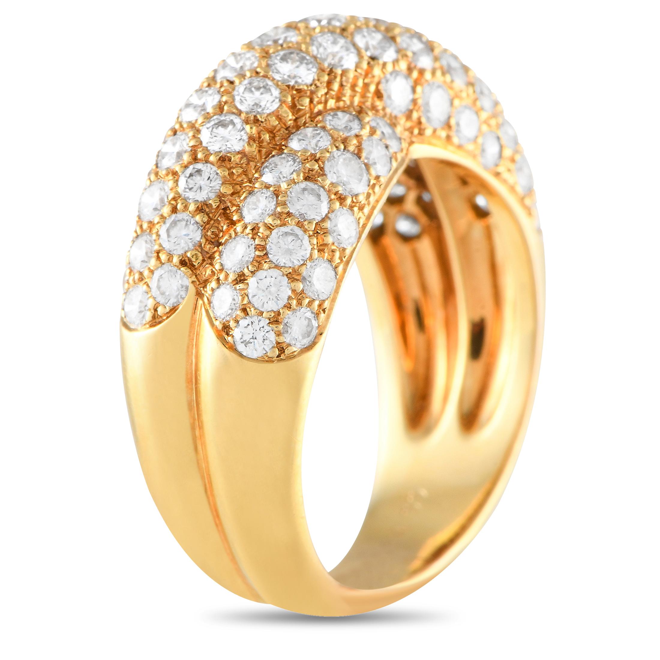 From Van Cleef & Arpels, here is an elegant cross-over band with pav-set brilliant diamonds. A beautiful harmony can be seen in the interplay of form, luster, and brilliance. The ring's top dimensions measure 18mm by 8mm.This vintage Van Cleef &