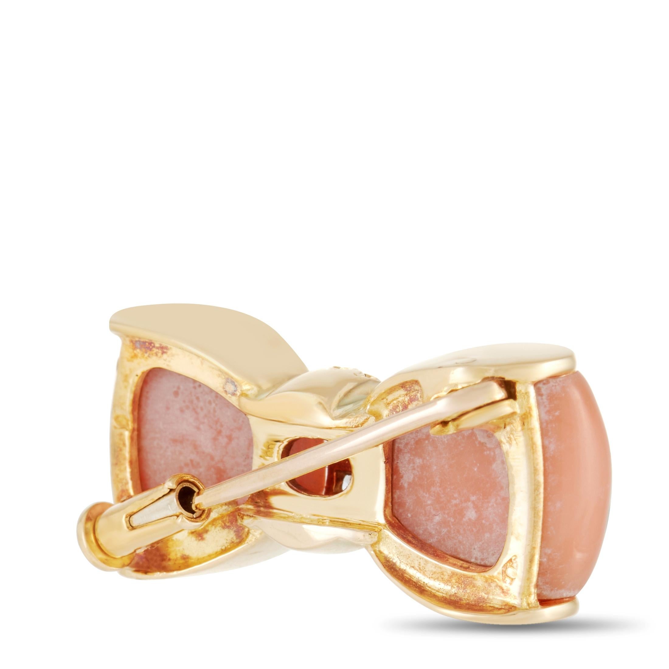 This charming vintage brooch from Van Cleef & Arpels is poised to make a luxurious statement no matter where it’s worn. Measuring 0.5” long and 1” wide, Coral and 18K Yellow Gold pair together beautifully. At the center, an array of diamonds