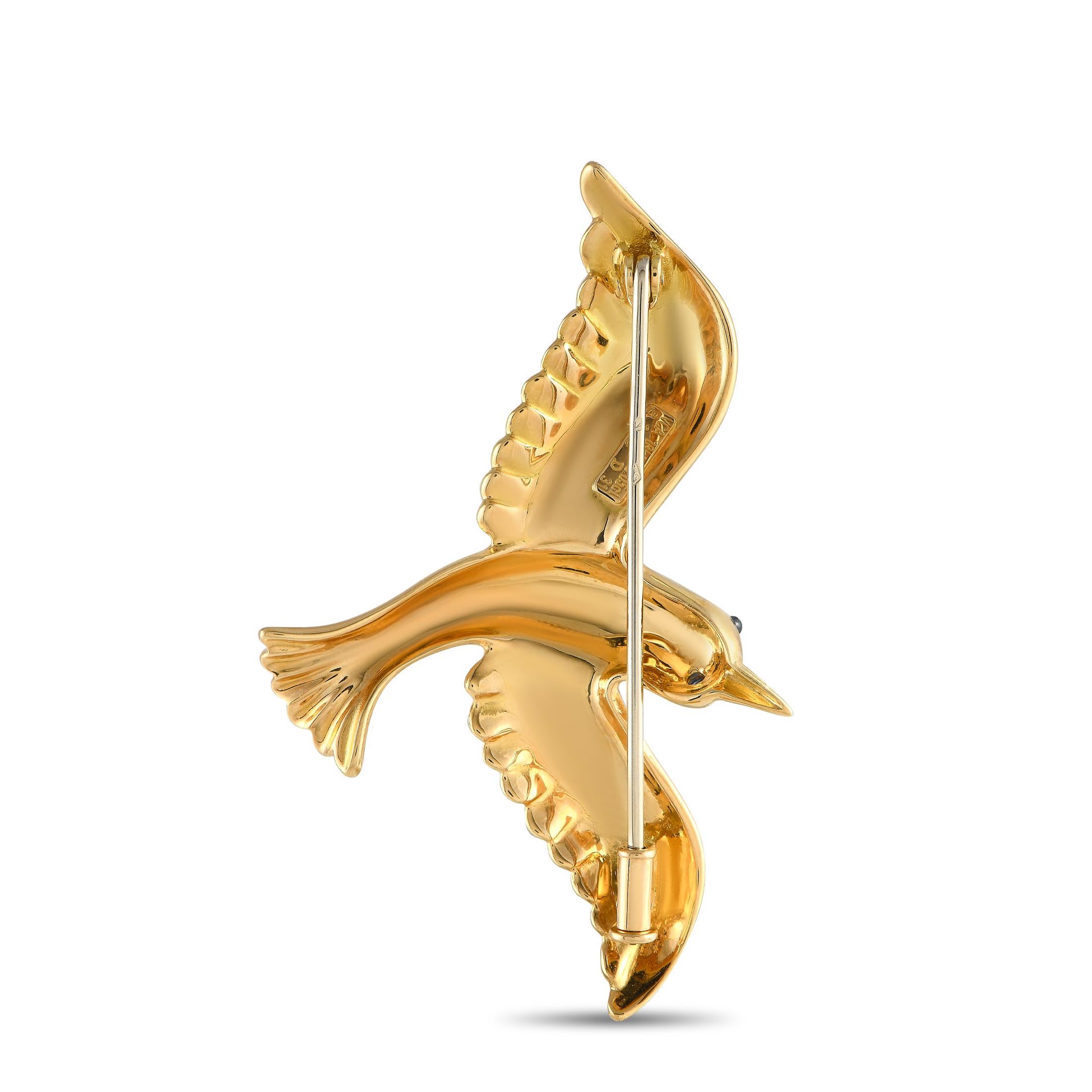 This vintage Van Cleef & Arpels brooch will serve as a stunning addition to any jewelry collection. The intricate design is crafted from 18K yellow gold and beautifully depicts a bird in flight. It measures 1.35” long and 2.15” wide. 

This jewelry