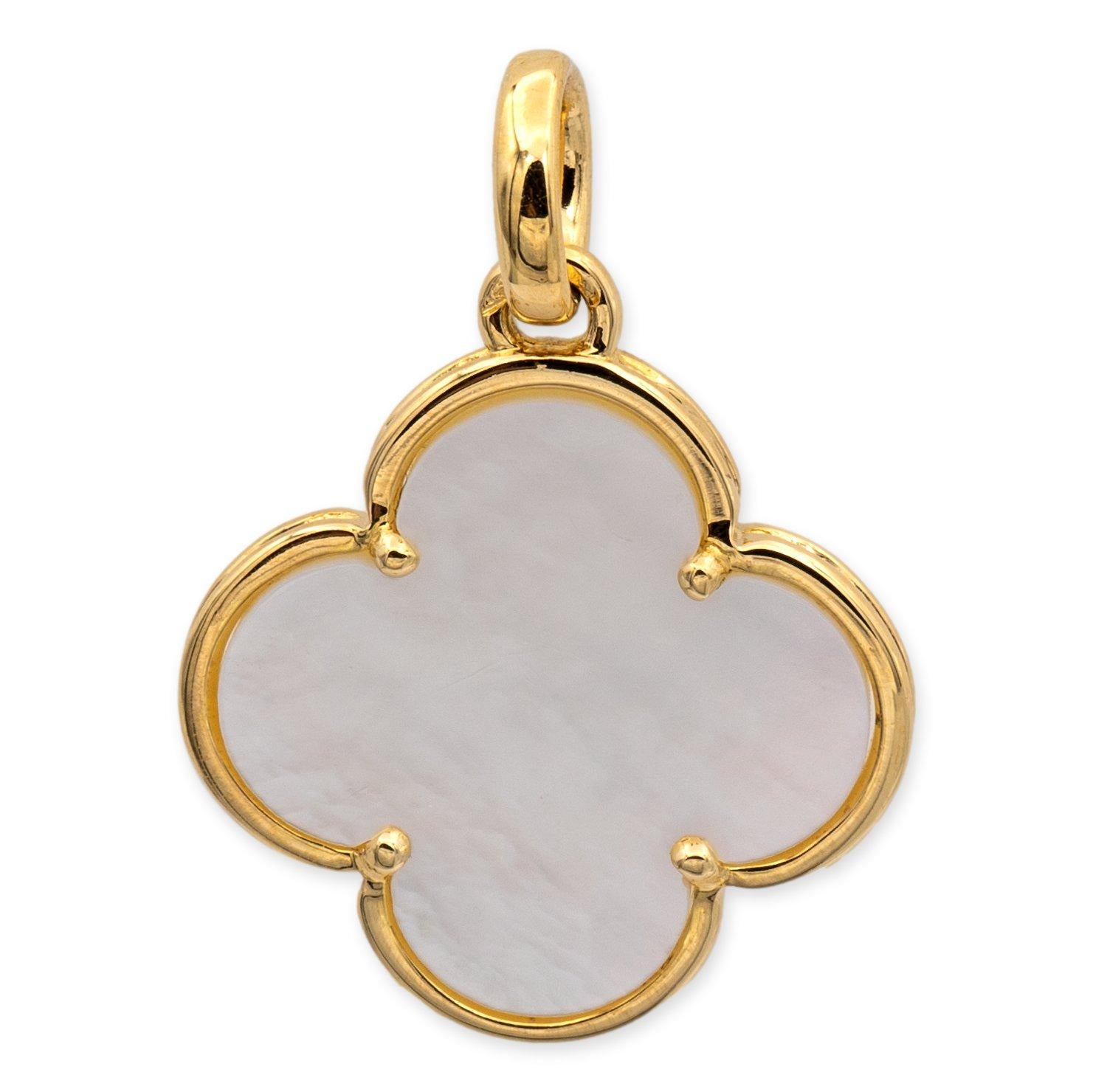 Van Cleef & Arpels pendant from the Pure Alhambra collection finely crafted in 18 karat yellow gold featuring a clover mother of pearl inlaid center with yellow gold frame hanging off round link bail. This is a large model measuring 26 mm, made in