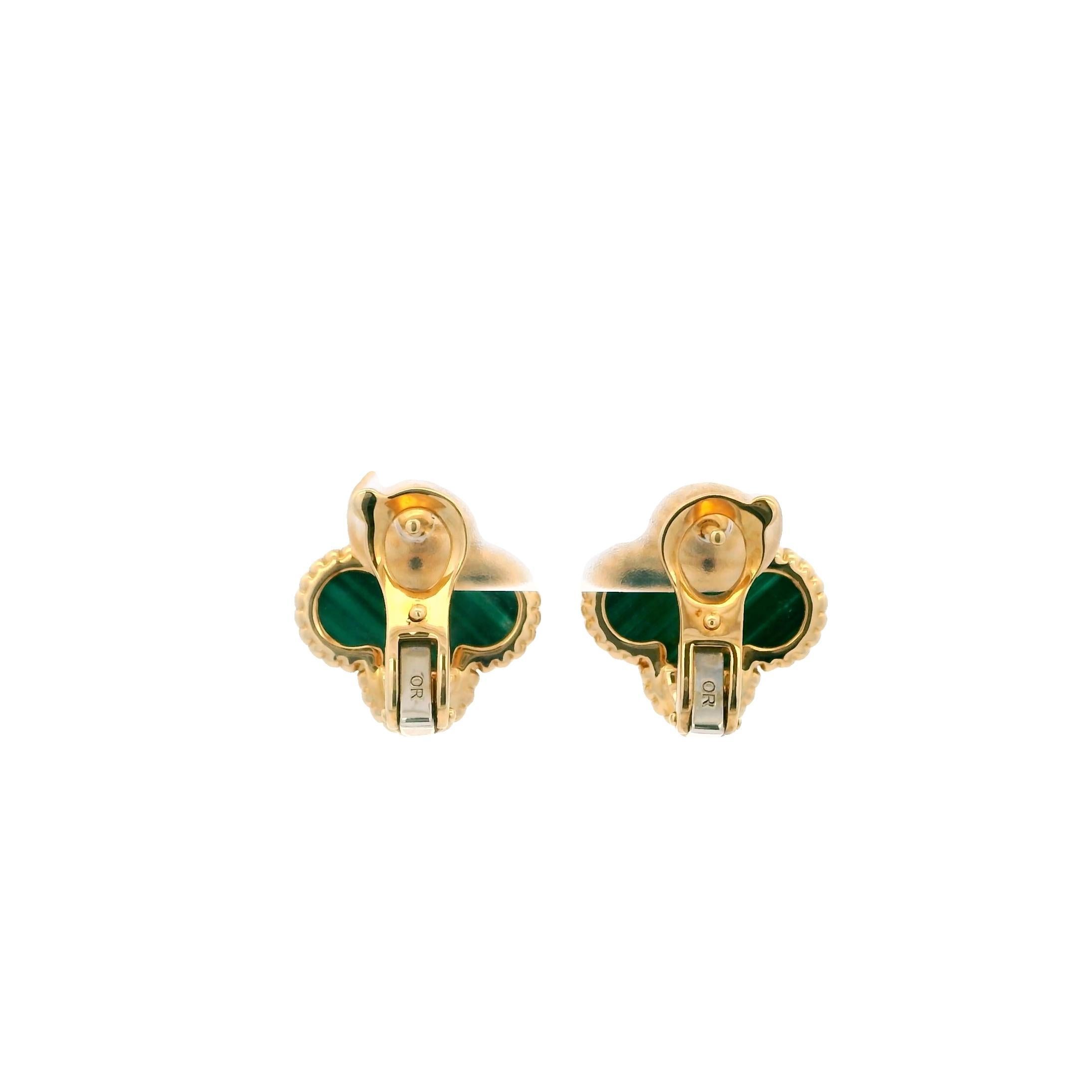 Van Cleef & Arpels elegant malachite earrings from 2017.

These distinctive earrings are crafted in 18k yellow gold.

Each earring features a clover-shaped malachite stone, set within a delicate gold beaded bezel.

The malachite displays rich green