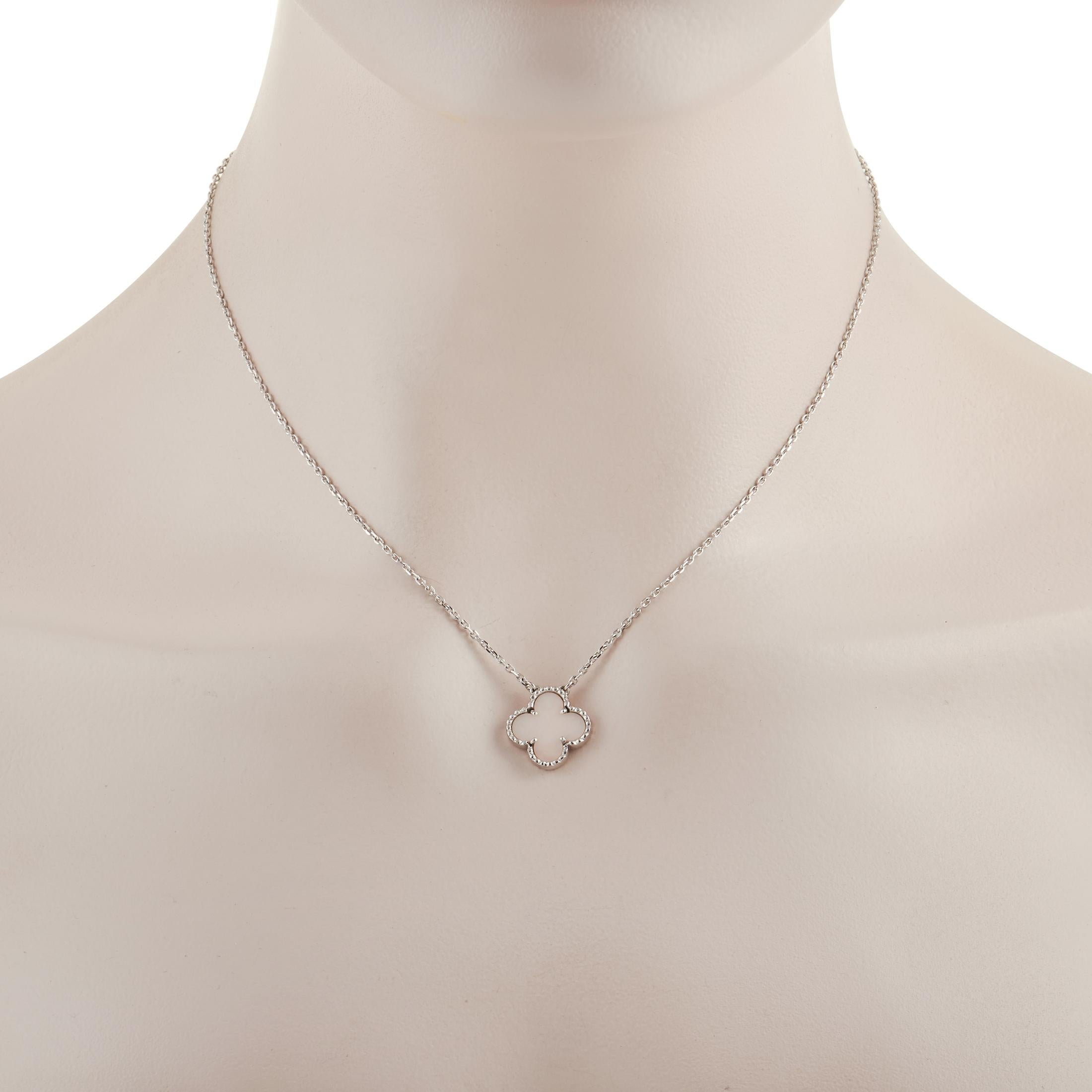 The iconic clover makes a stylish statement on this Van Cleef & Arpels Alhambra pendant necklace. Opulent pink opal elevates the center of the pendant, which measures .5” round. You’ll also find opulent 18K White Gold on the 16” chain and millegrain