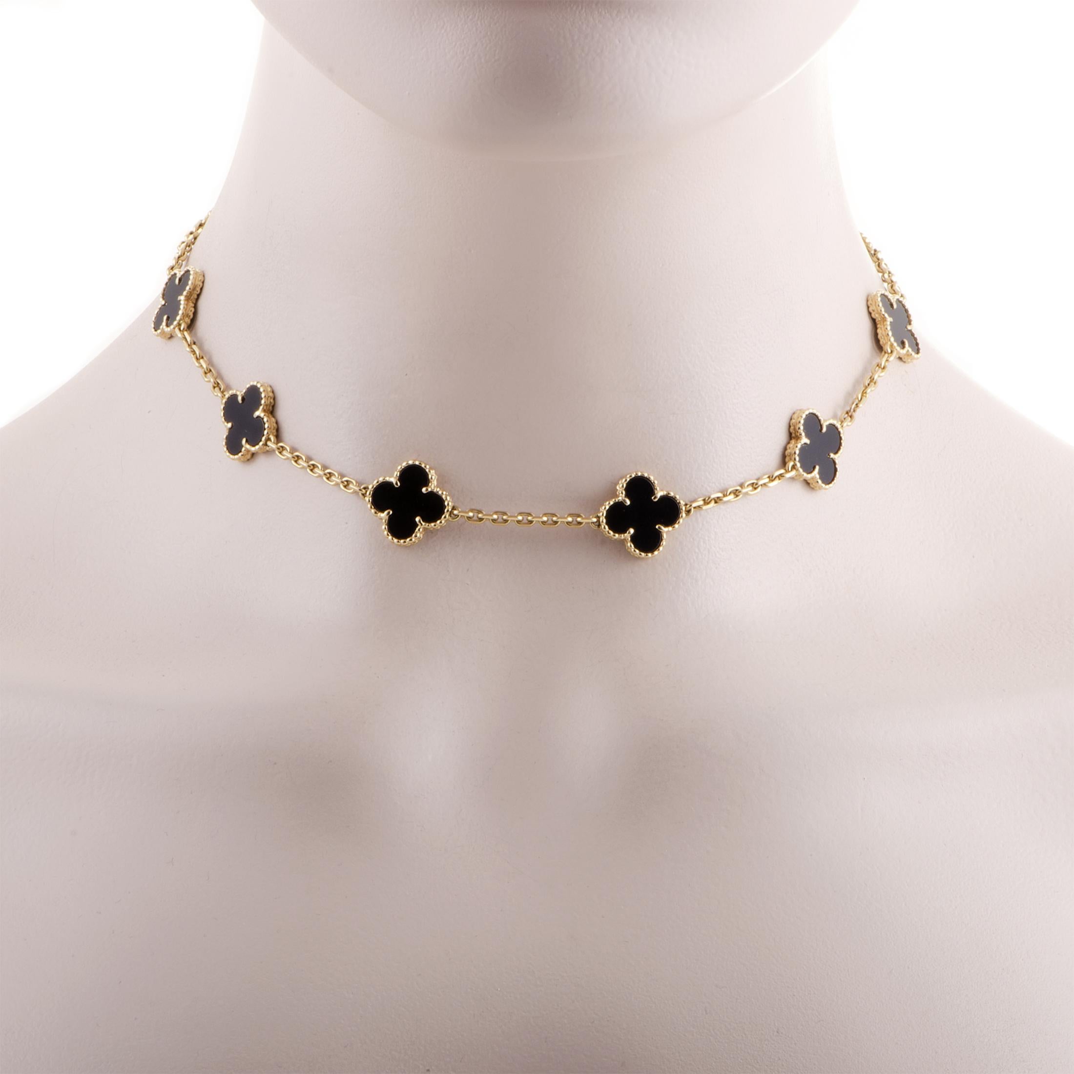 The minimalistic and irresistible motif which makes the esteemed Alhambra collection instantly recognizable and highly revered is employed in this enchanting 18K yellow gold necklace from Van Cleef & Arpels that also boasts captivating onyx stones.