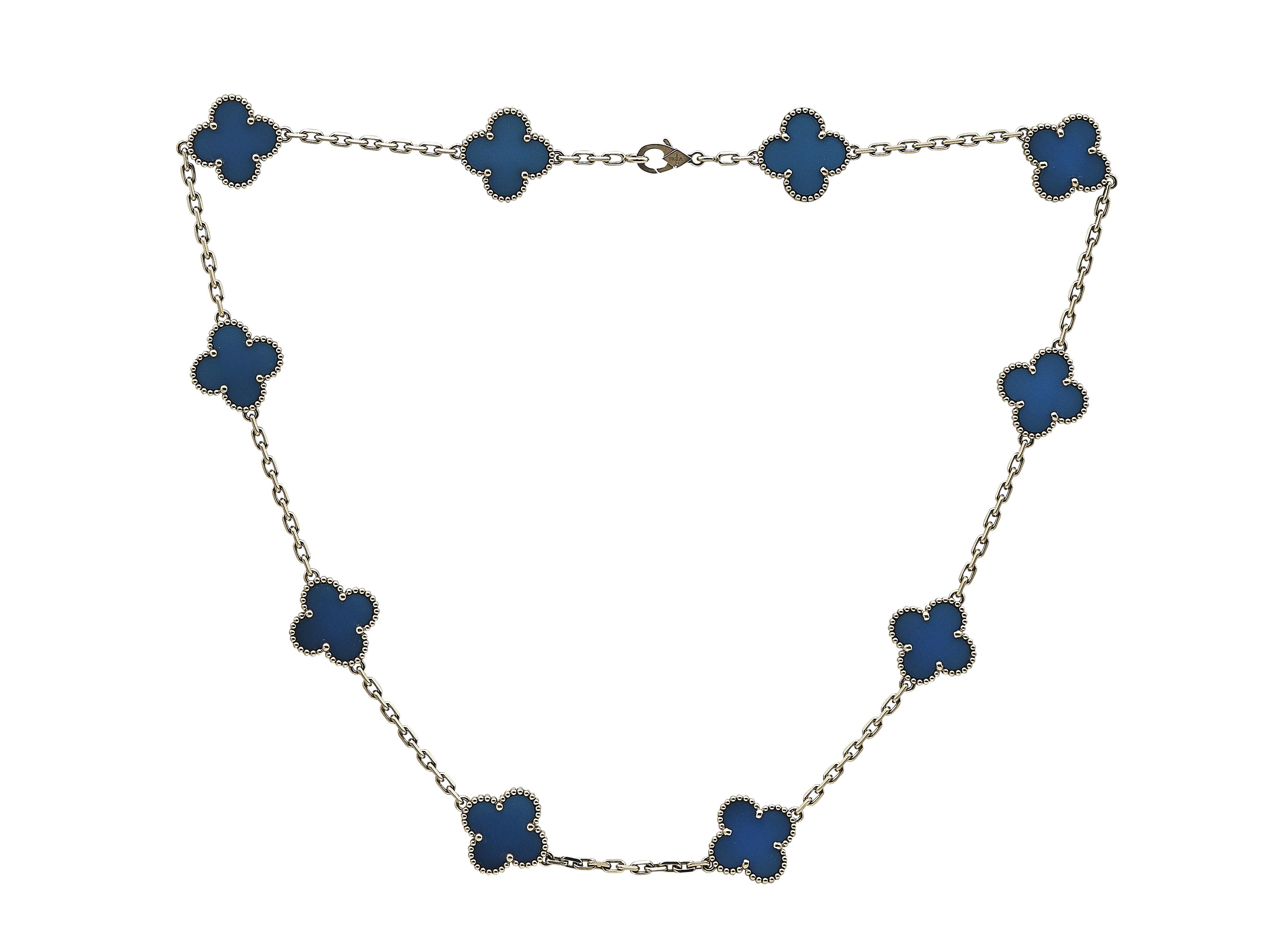 The bracelet: A Van Cleef & Arpels Vintage Alhambra eighteen karat yellow gold necklace. The ten motifs are carved from blue agate that is highly polished to create an impressive reflection when worn on the neck.

The necklace is in excellent