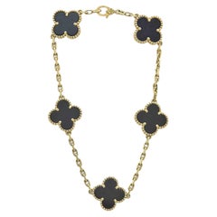 Bracelet Vintage Alhambra de Van Cleef & Arpels en or jaune 18 carats et onyx