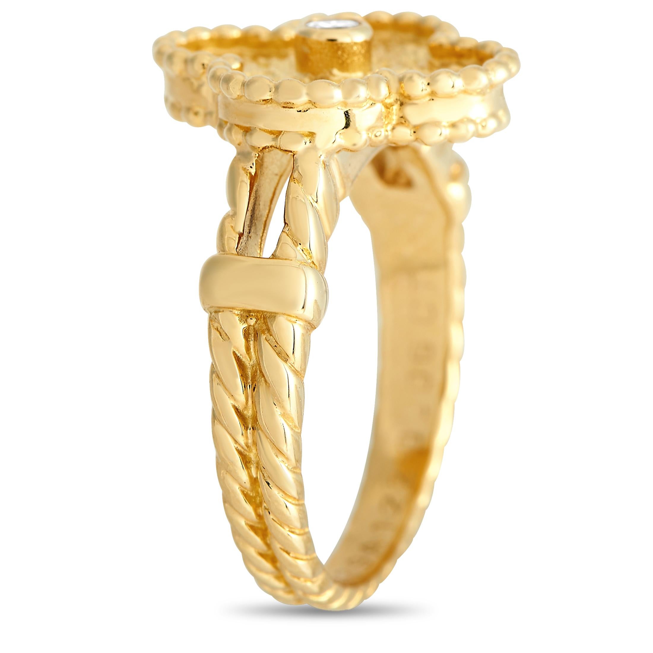 Elevate your accessorizing game with the vintage elegance of this Van Cleef & Arpels ring. This simple yet ornate ring in 18k yellow gold features a split shank with a rope texture and polished collars. The centerpiece is an Alhambra motif with
