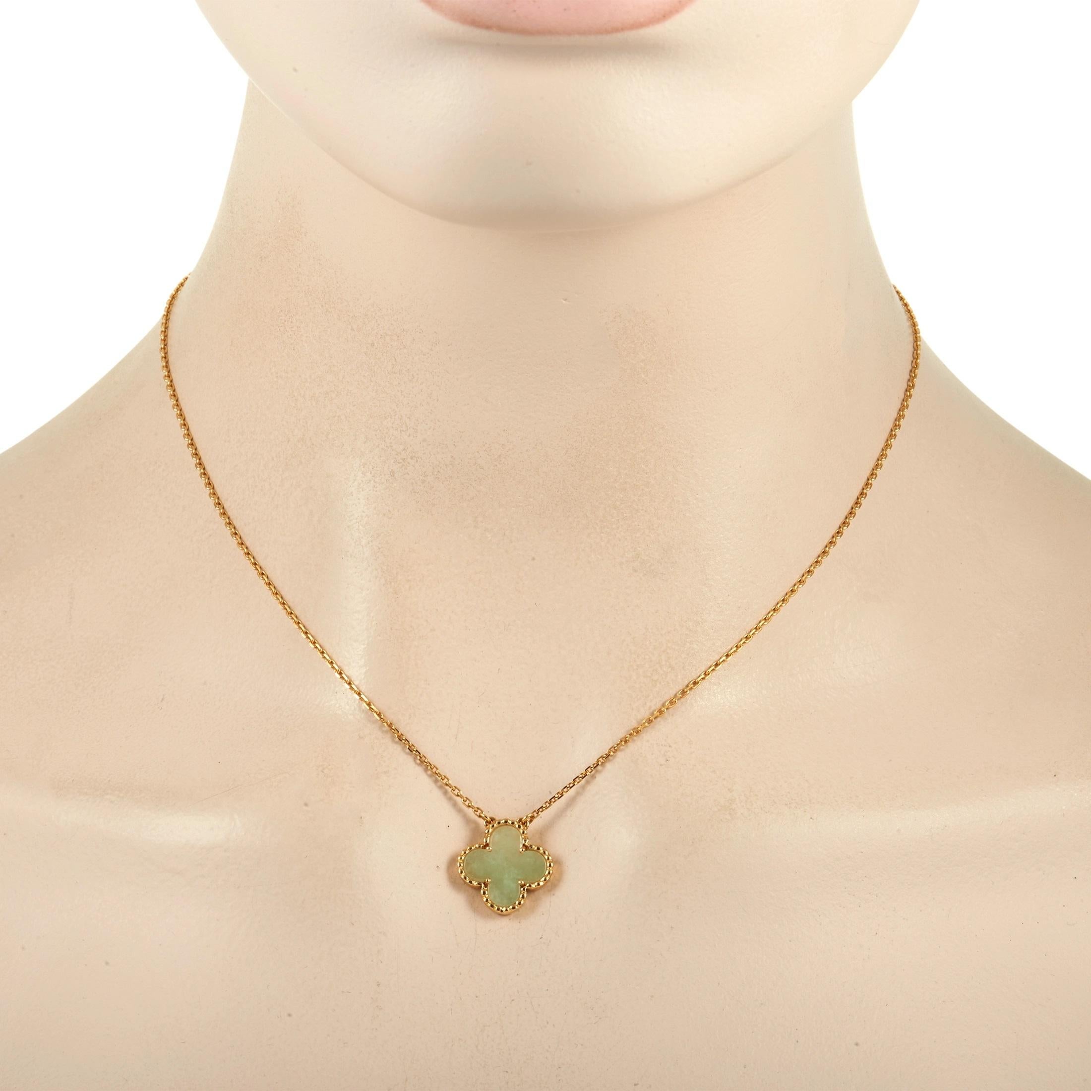 Captivating green Jade and opulent 18K Yellow Gold pair together perfectly on this exquisite vintage pendant necklace from Van Cleef & Arpels. The simple pendant measures 0.5” round and features the brand’s iconic Alhambra design. It’s suspended